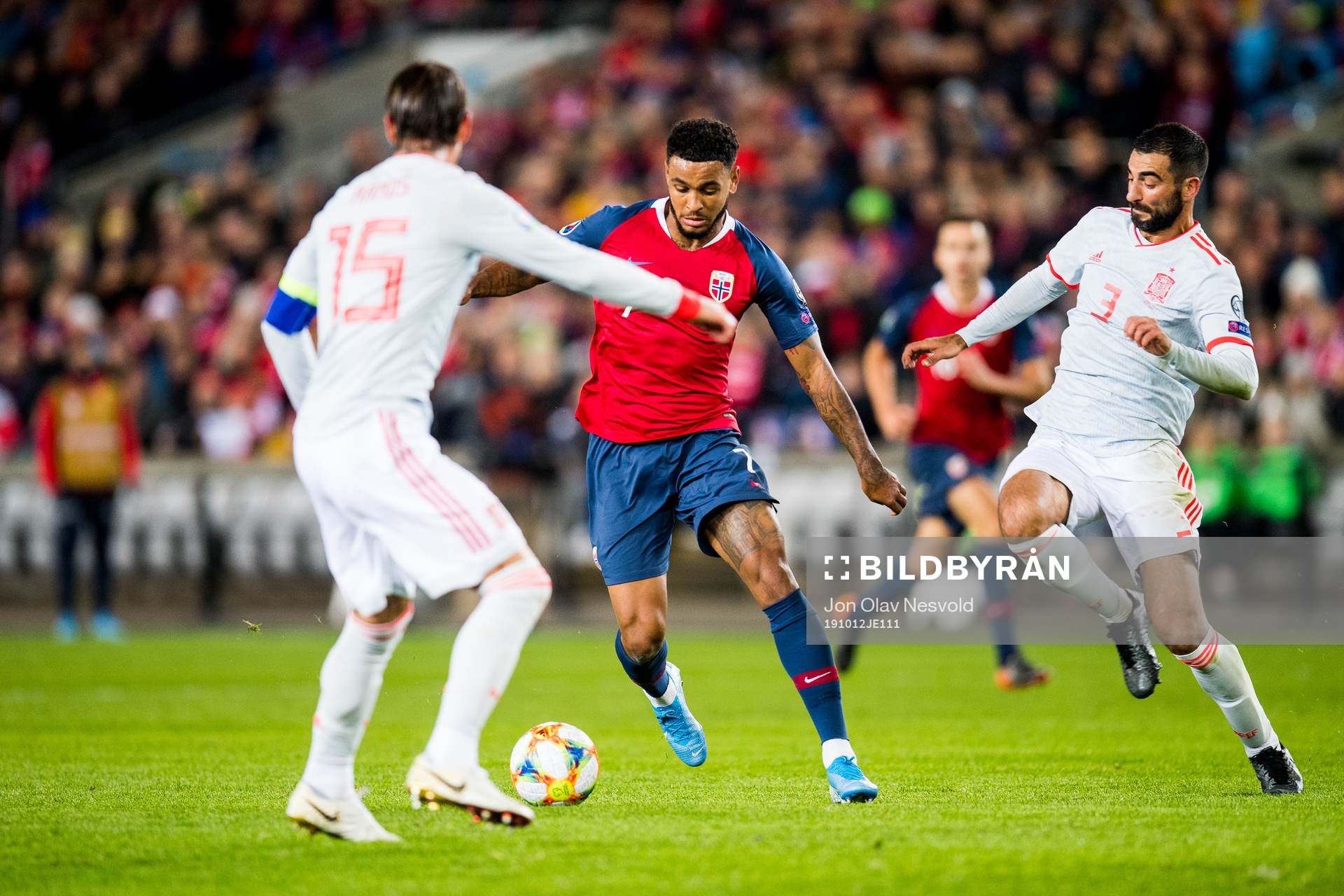 Joshua King of Norway and Raul Albiol of Spain