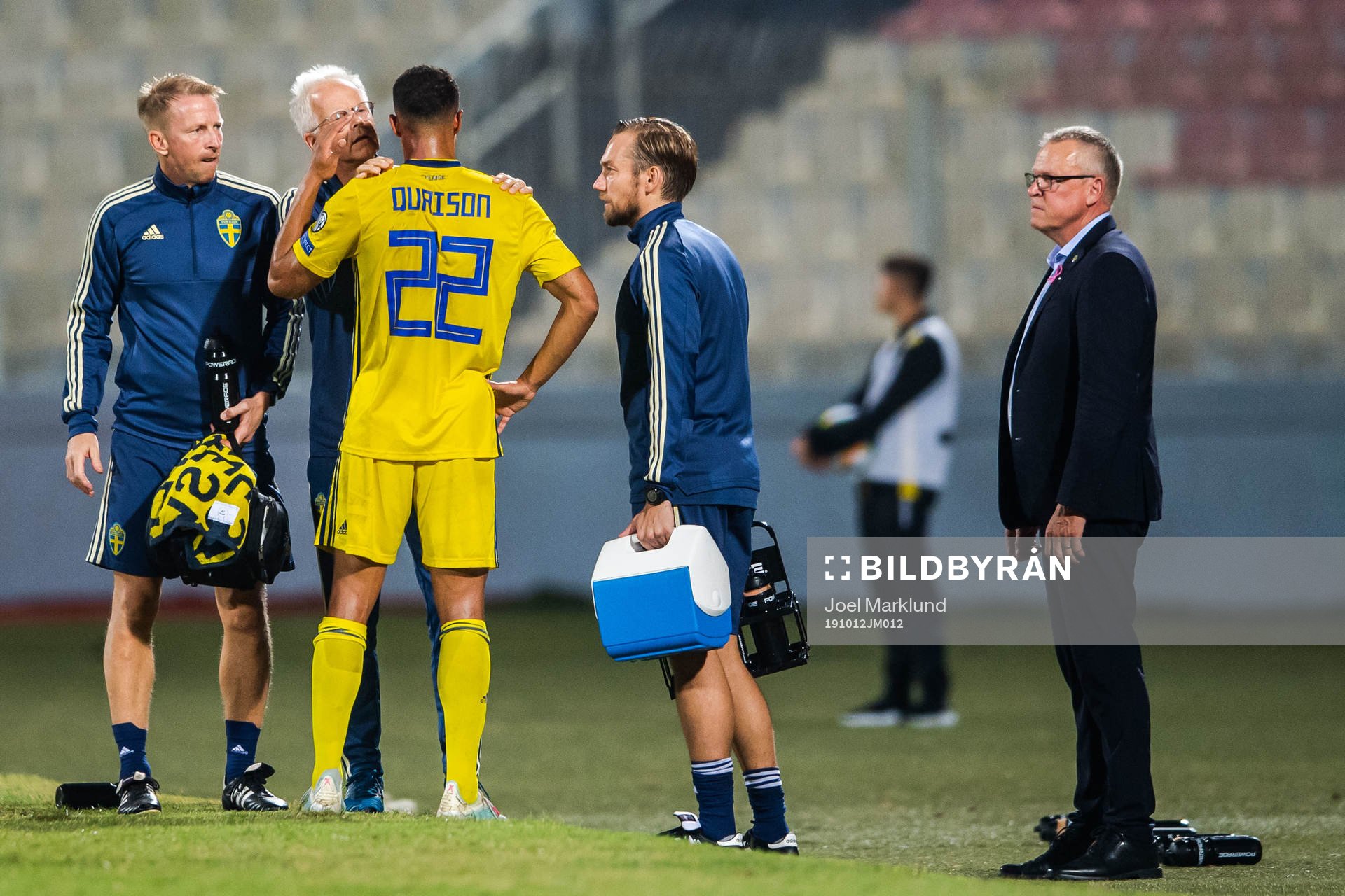Robin Quaison of Sweden receives medical treatment
