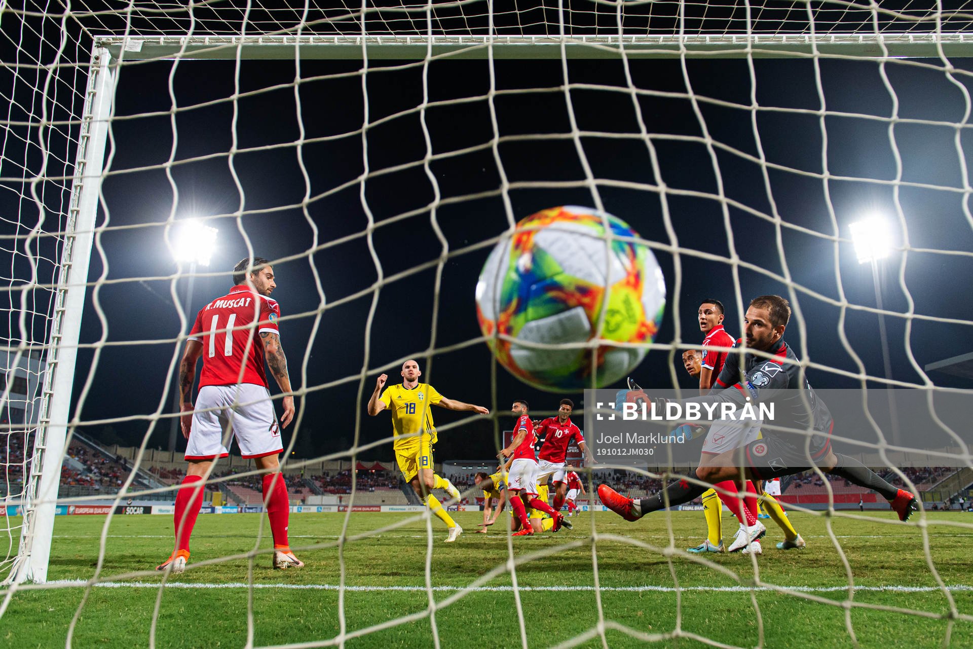 Marcus Danielson of Sweden scores 0-1 behind goalkeeper