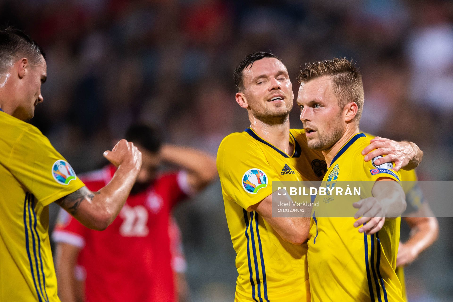 Mikael Lustig, Marcus Berg and Sebastian Larsson of Sweden