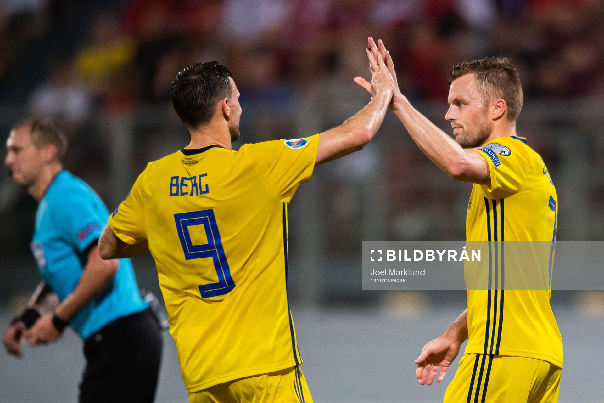 Marcus Berg and Sebastian Larsson of Sweden celebrate