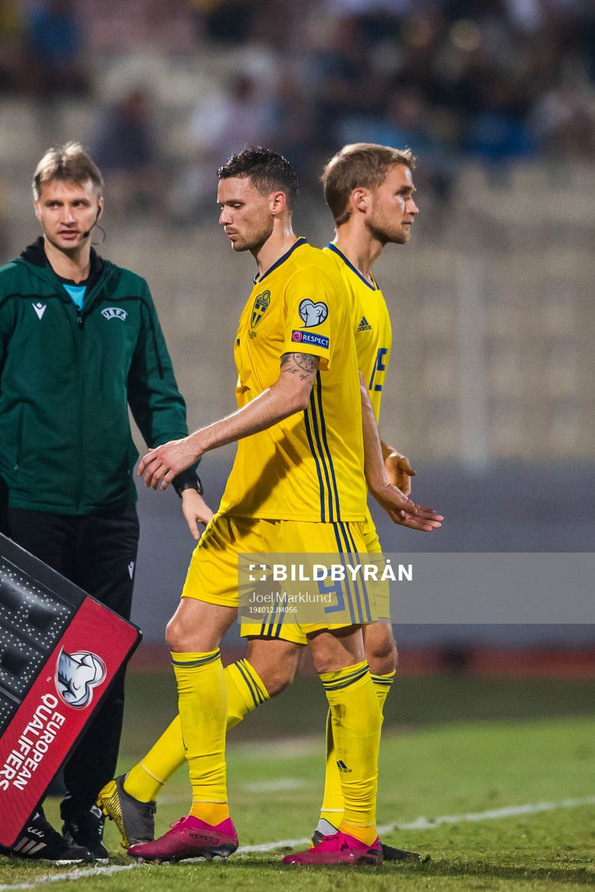 Marcus Berg changes with Sebastian Andersson of Sweden