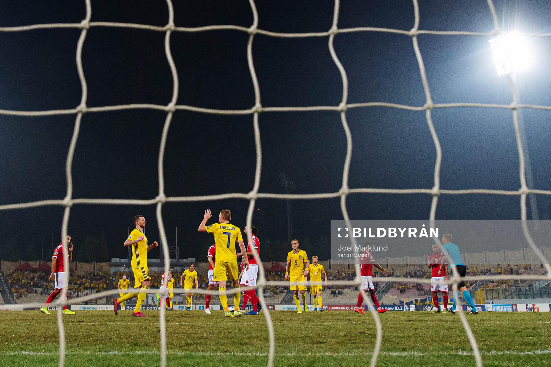 Marcus Berg and Sebastian Larsson of Sweden celebrate the