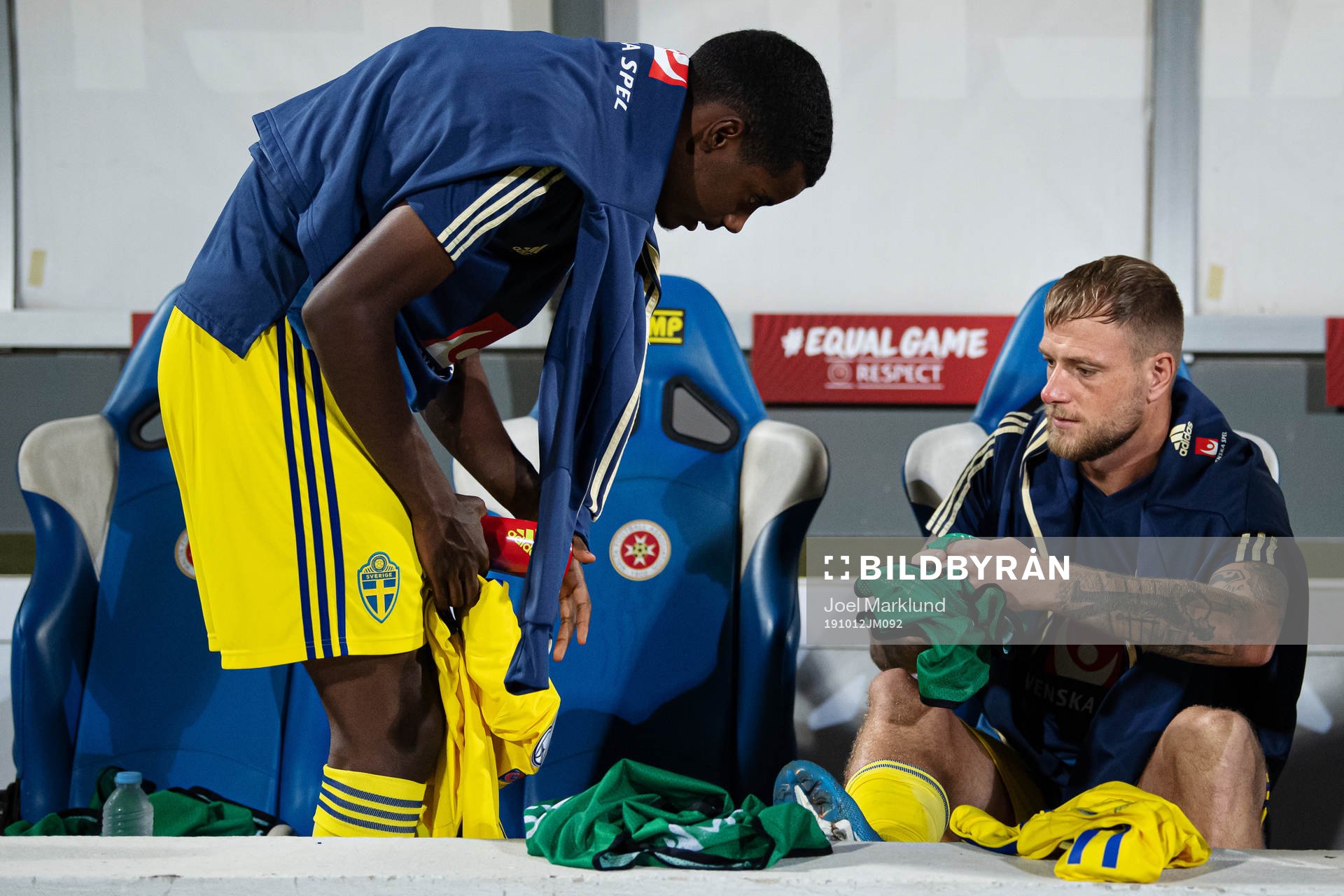 Alexander Isak and John Guidetti of Sweden at the bench
