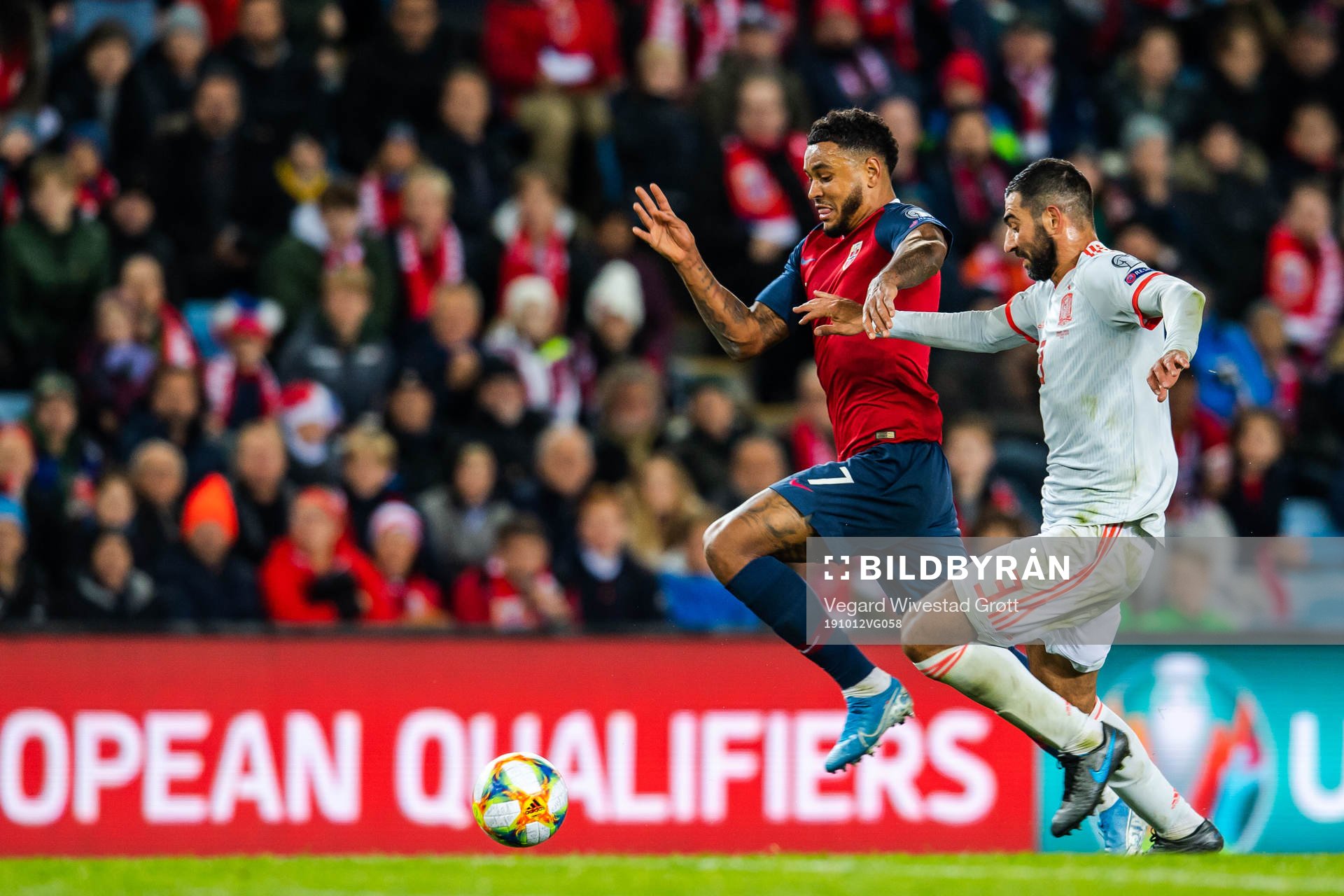 Joshua King of Norway and Raul Albiol of Spain