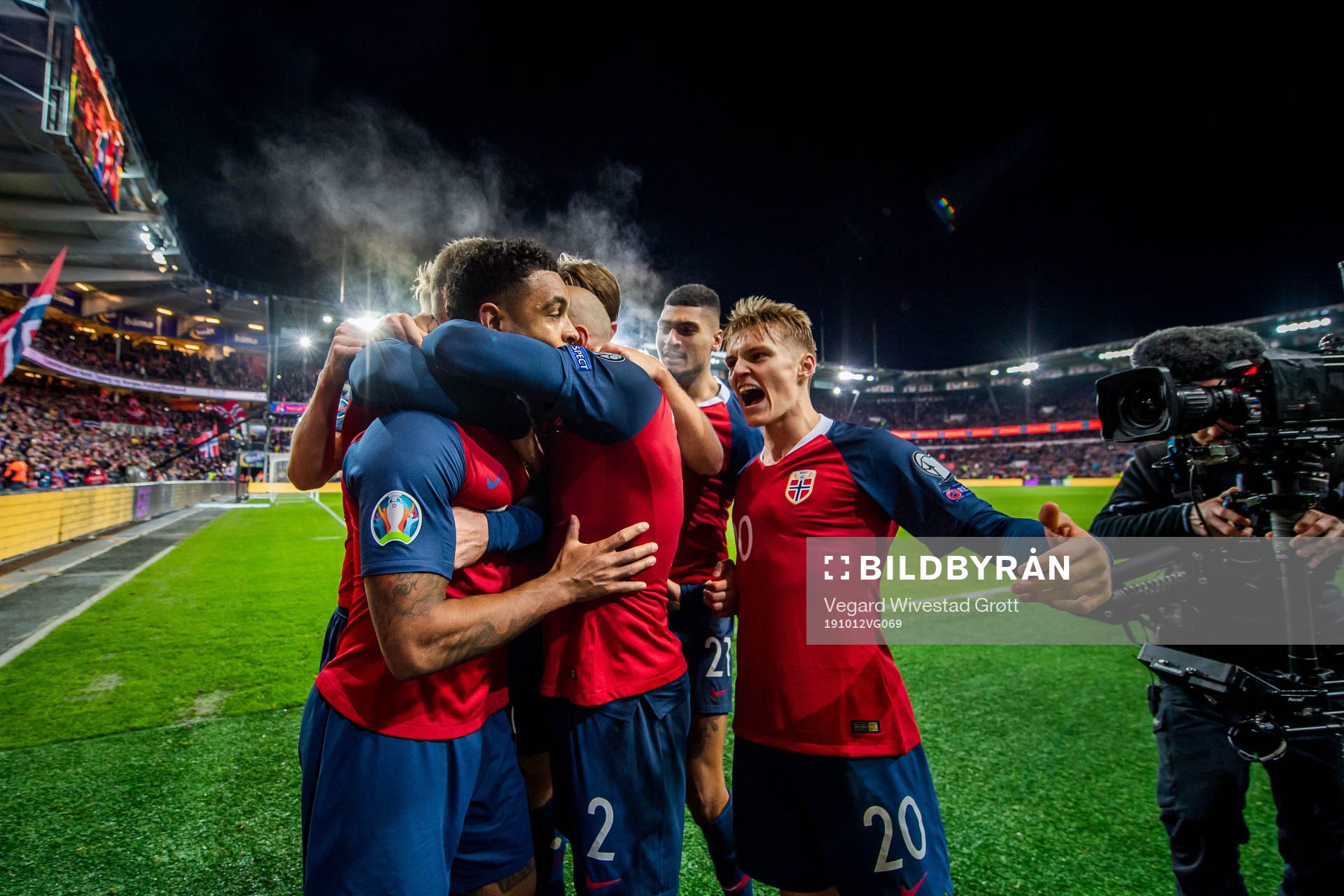Joshua King of Norway celebrates with Martin Ødegaard and