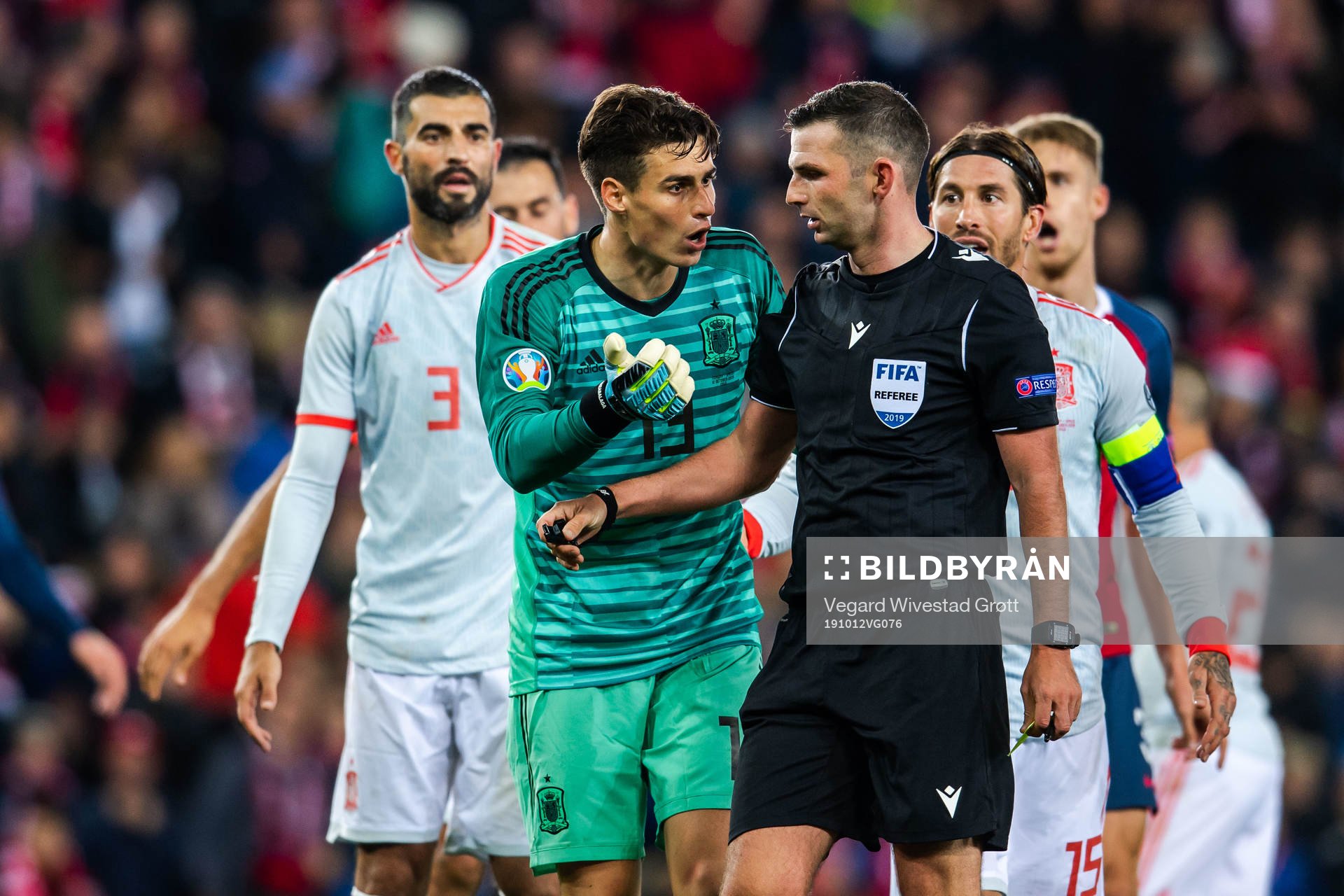 Goalkeeper Kepa Arrizabalaga in a conversation with referee