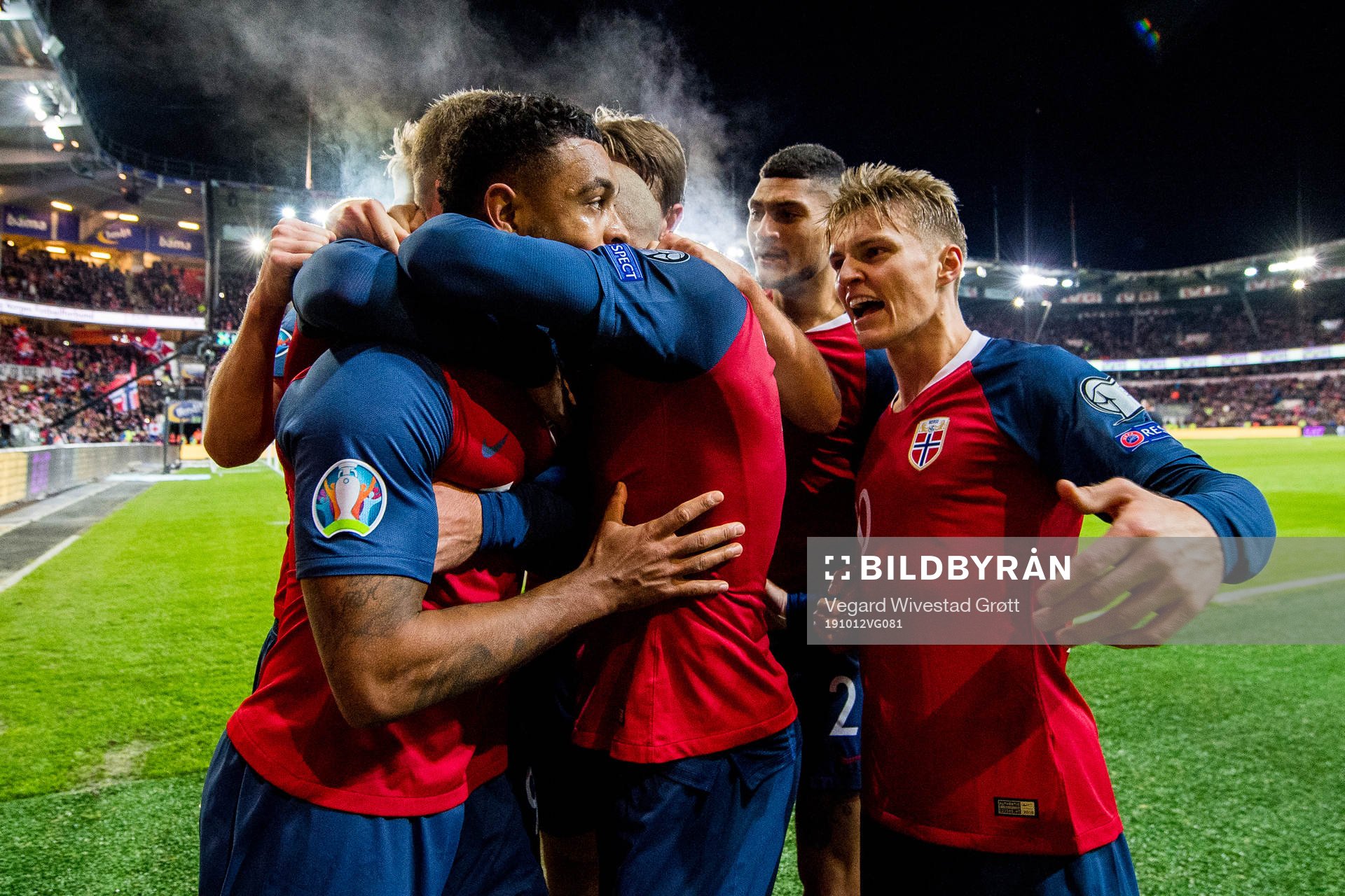 Joshua King of Norway celebrates with Martin Ødegaard and
