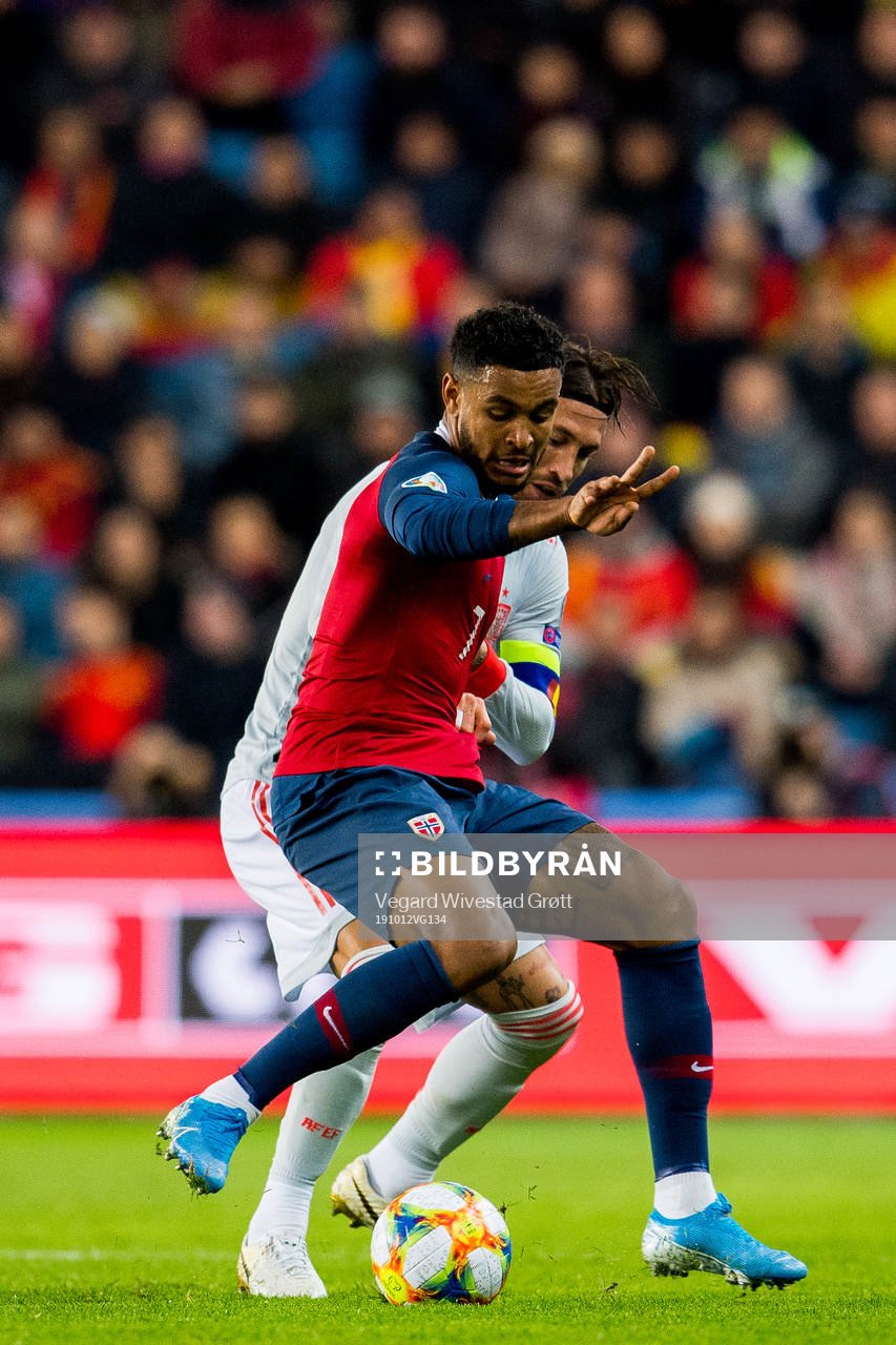 Joshua King of Norway and Sergio Ramos of Spain