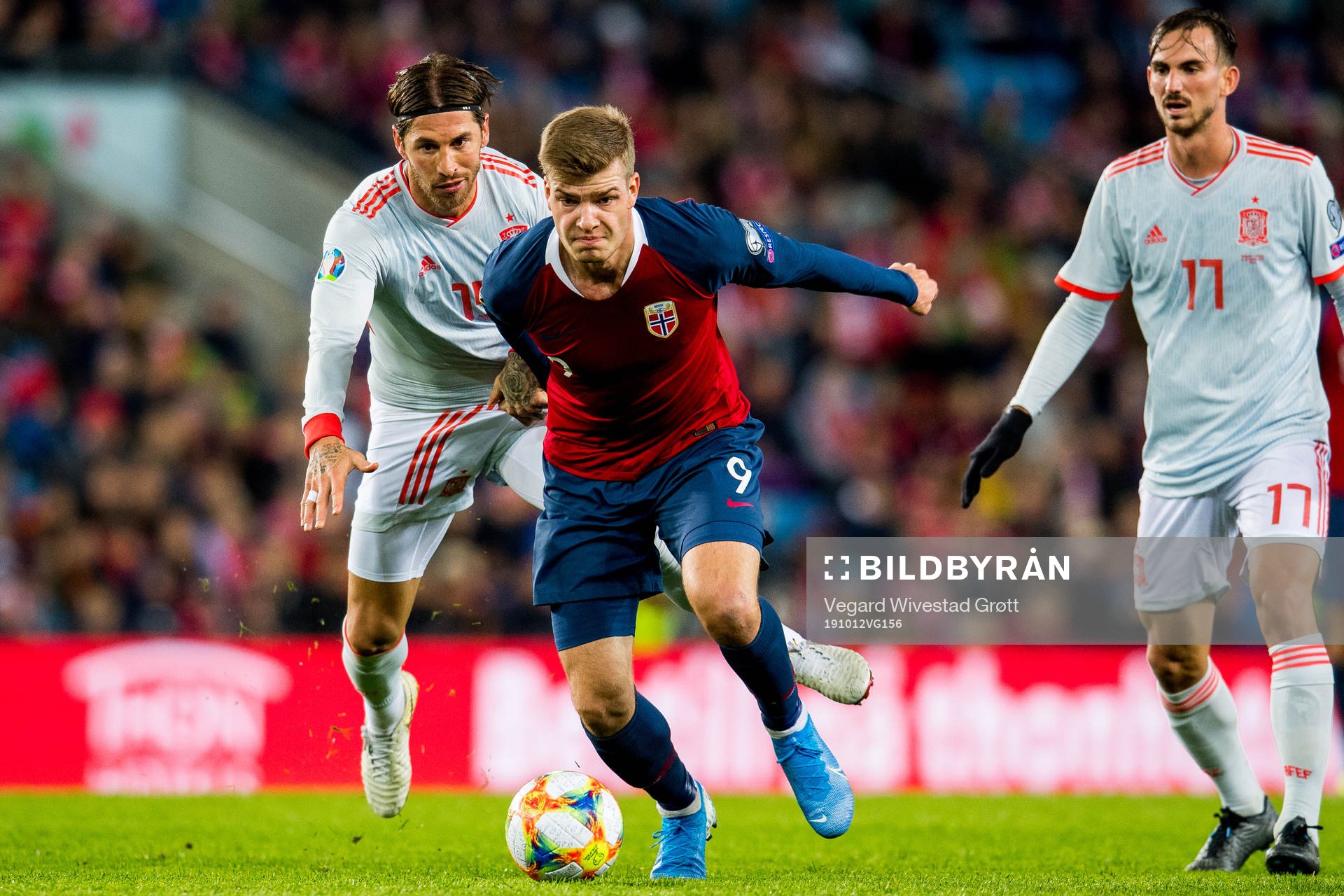 Sergio Ramos of Spain and Alexander Sørloth of Norway