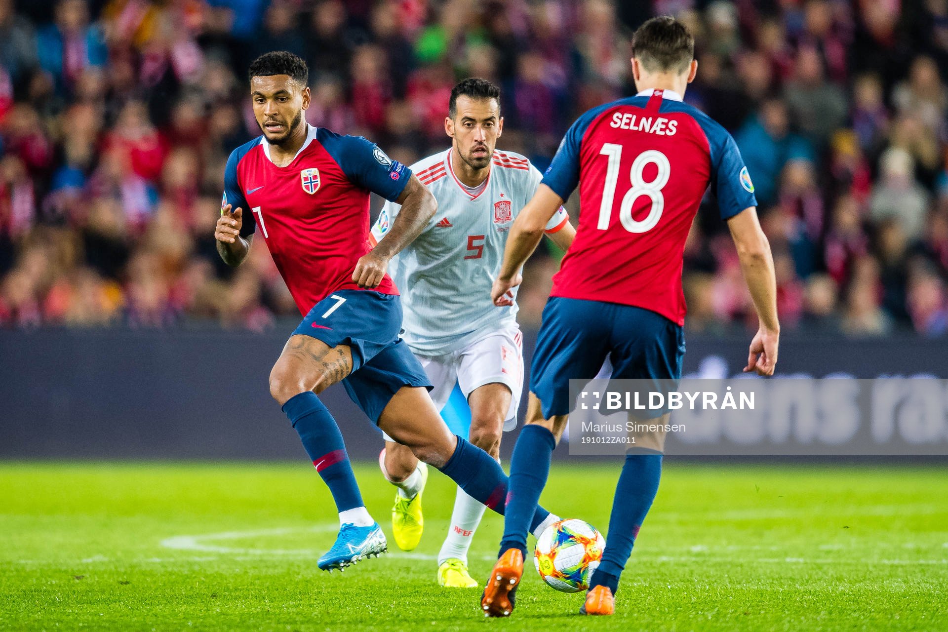 Joshua King of Norway and Sergio Busquets of Spain