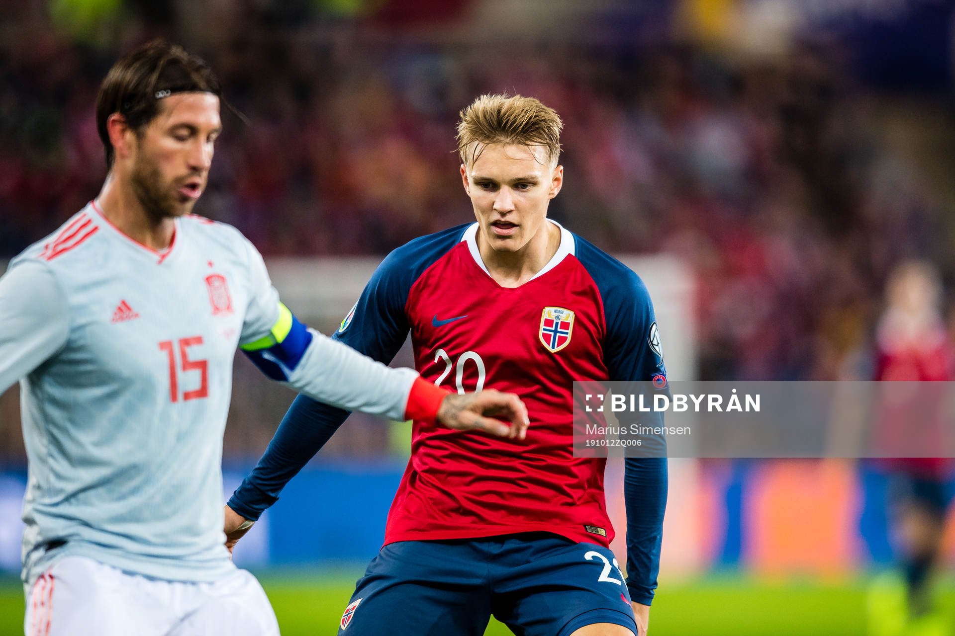 Sergio Ramos of Spain and Martin Ødegaard of Norway