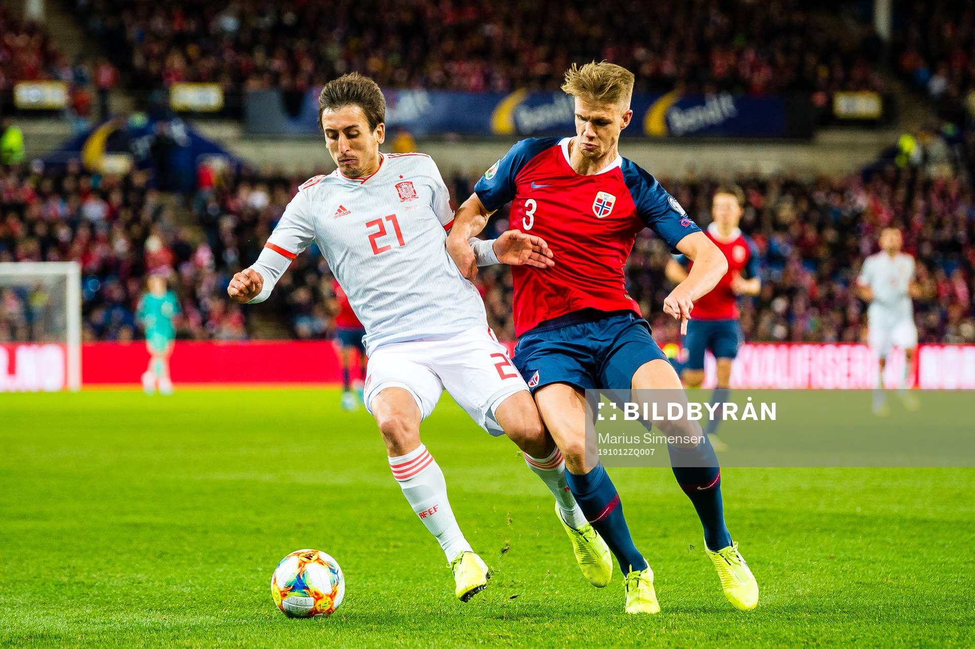 Mikel Oyarzabal of Spain and Kristoffer Ajer of Norway