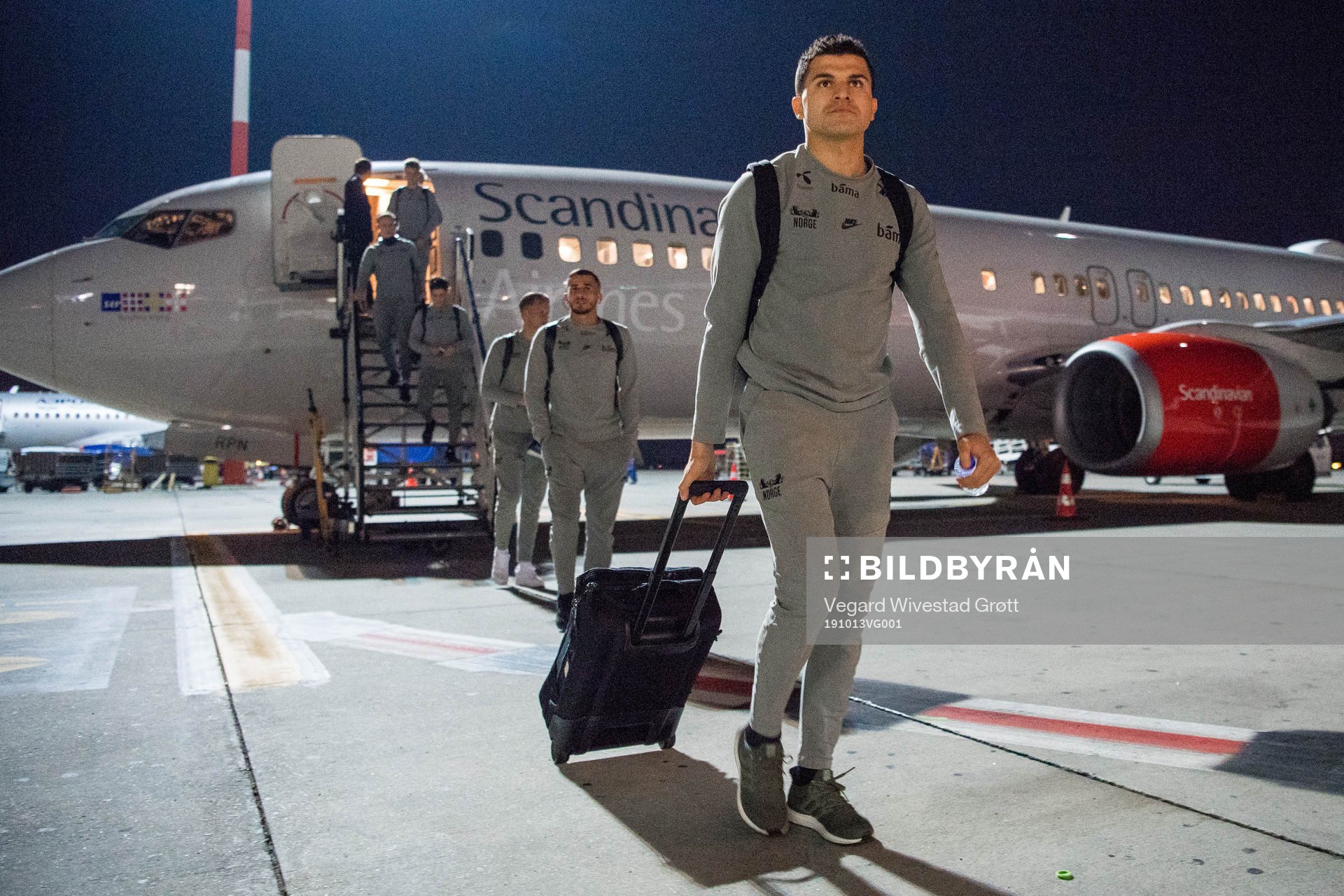 Tarik Elyounoussi of Norway arrives at Henri Coanda