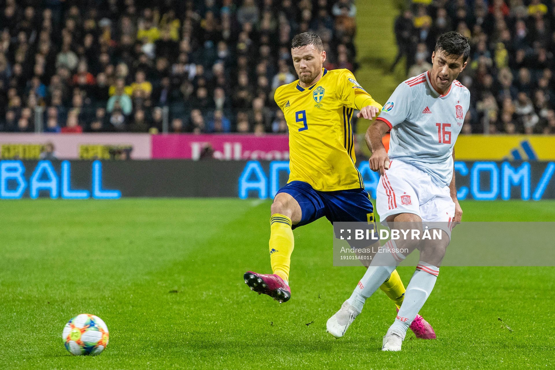 Marcus Berg of Sweden and Rodri of Spain