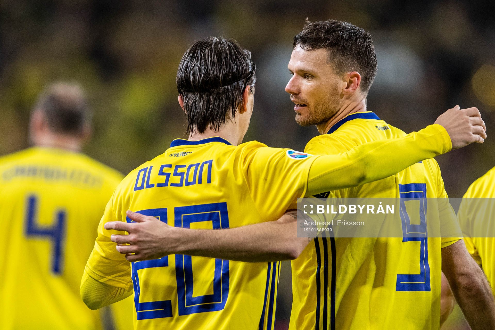 Kristoffer Olsson and Marcus Berg of Sweden celebrate
