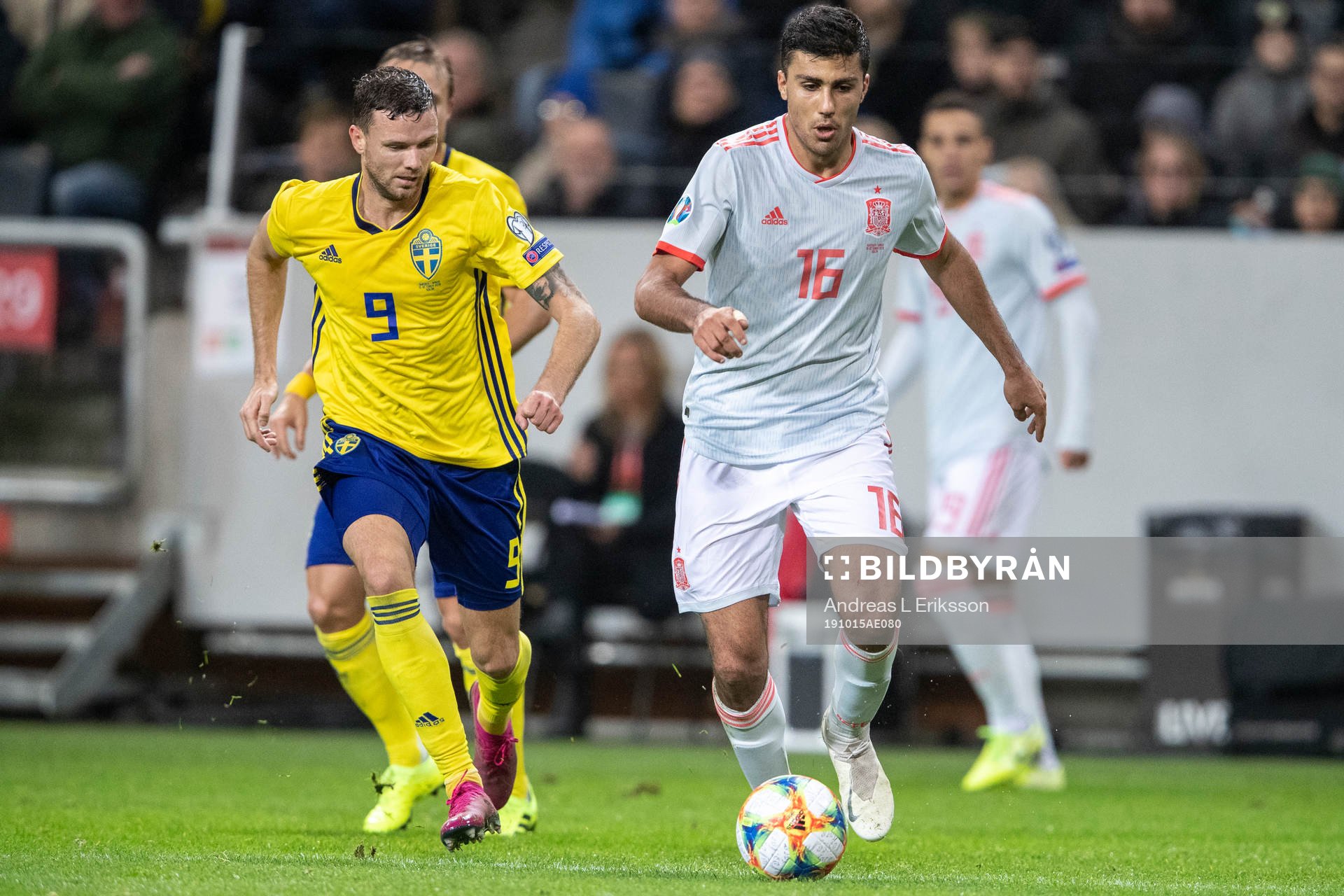Marcus Berg of Sweden and Rodri of Spain
