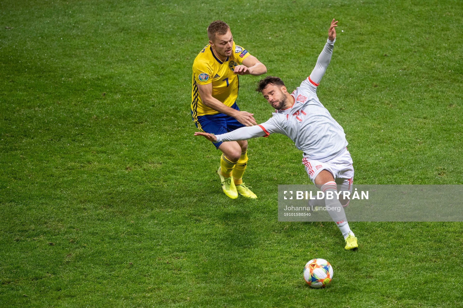 Sebastian Larsson of Sweden and Juan Bernat of Spain