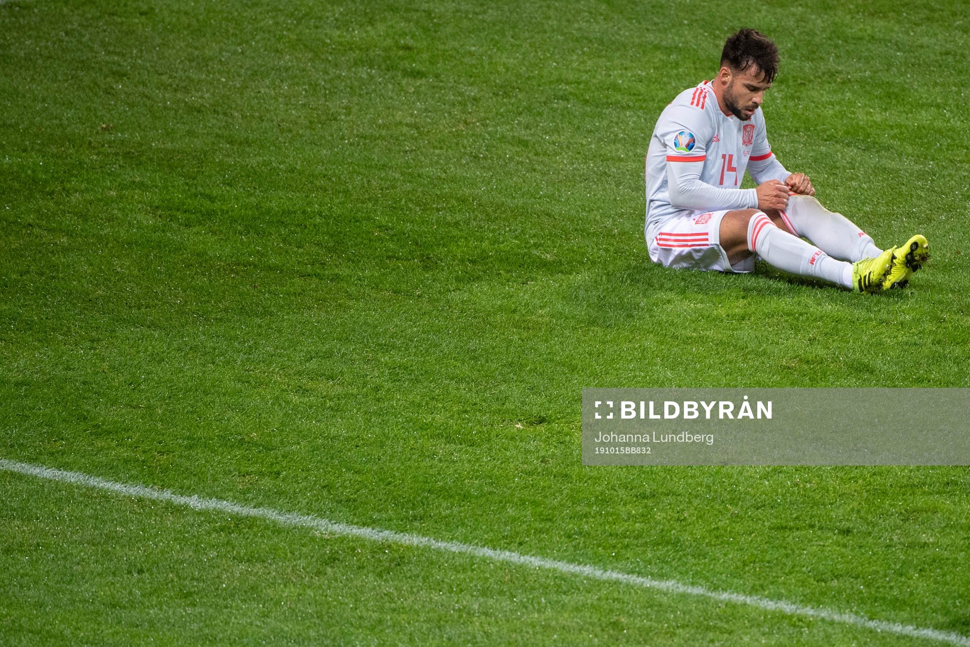 Juan Bernat of Spain looks dejected
