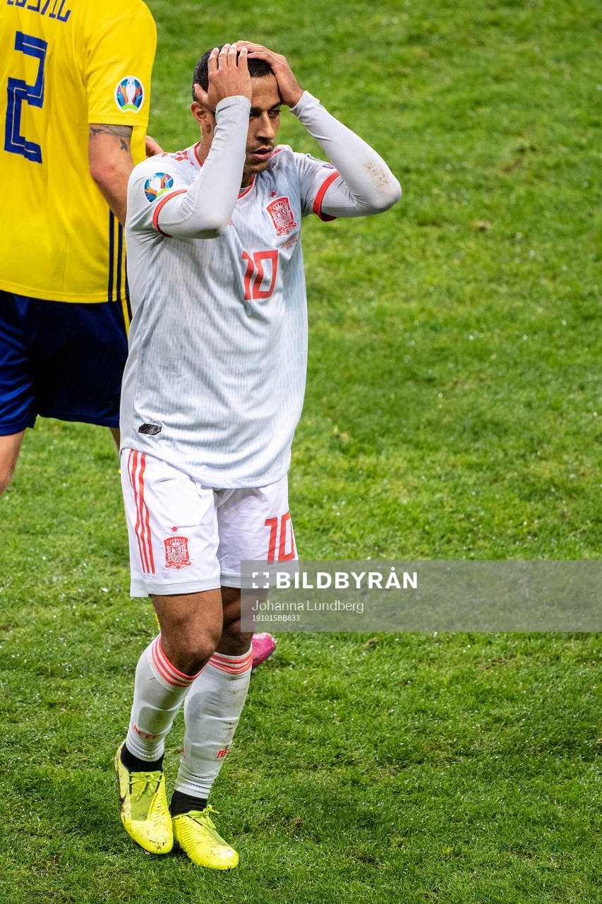 Thiago Alcantara of Spain reacts