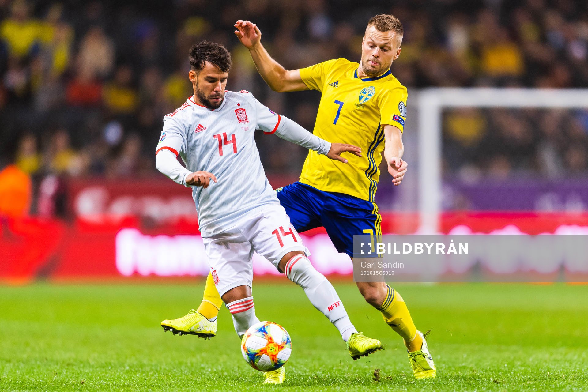 Juan Bernatof Spain and Sebastian Larsson of Sweden