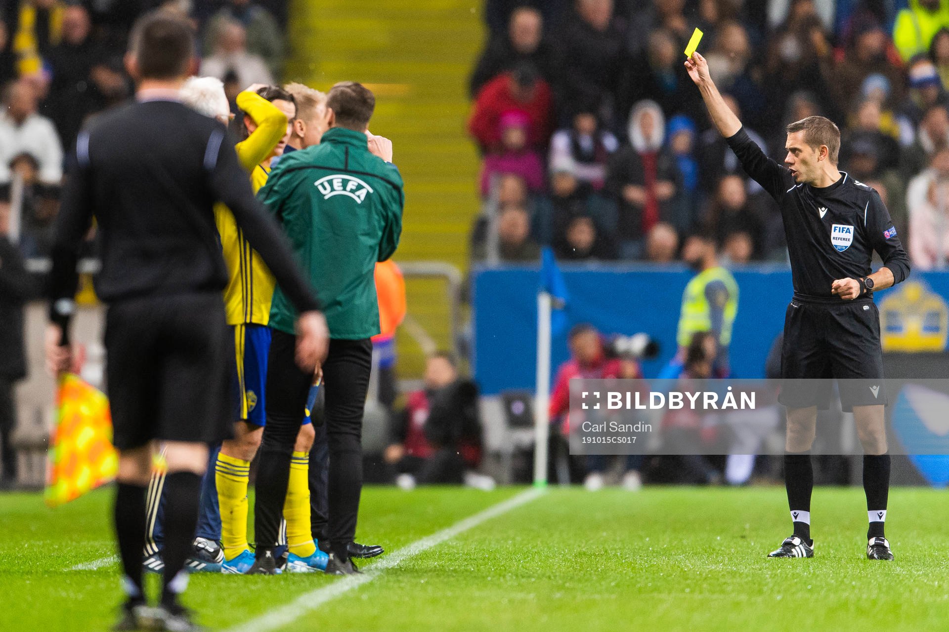 Janne Andersson, head coach of Sweden receives a yellow