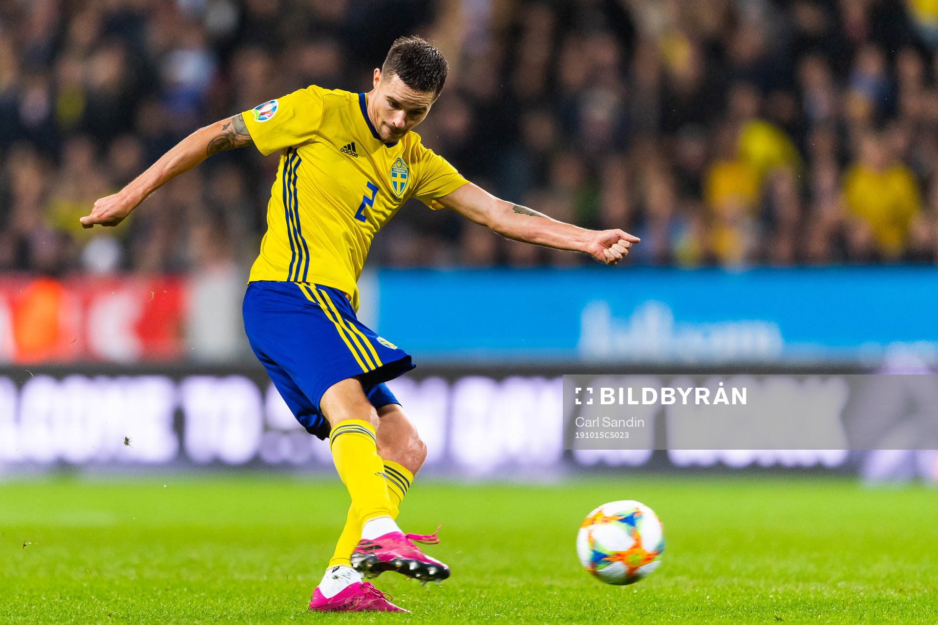 Mikael Lustig of Sweden shoots