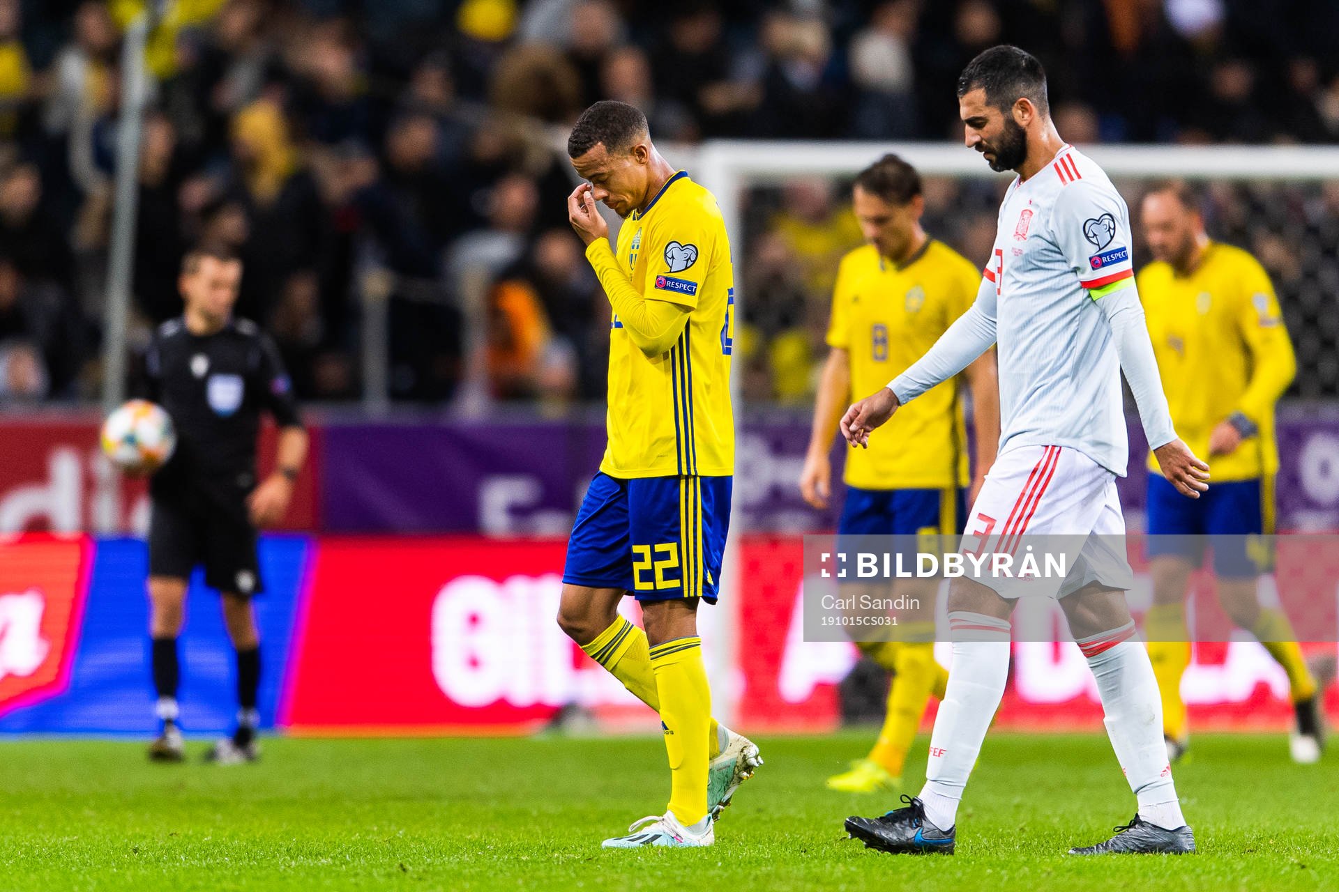 Robin Quaison of Sweden and Raul Albiol of Spain look