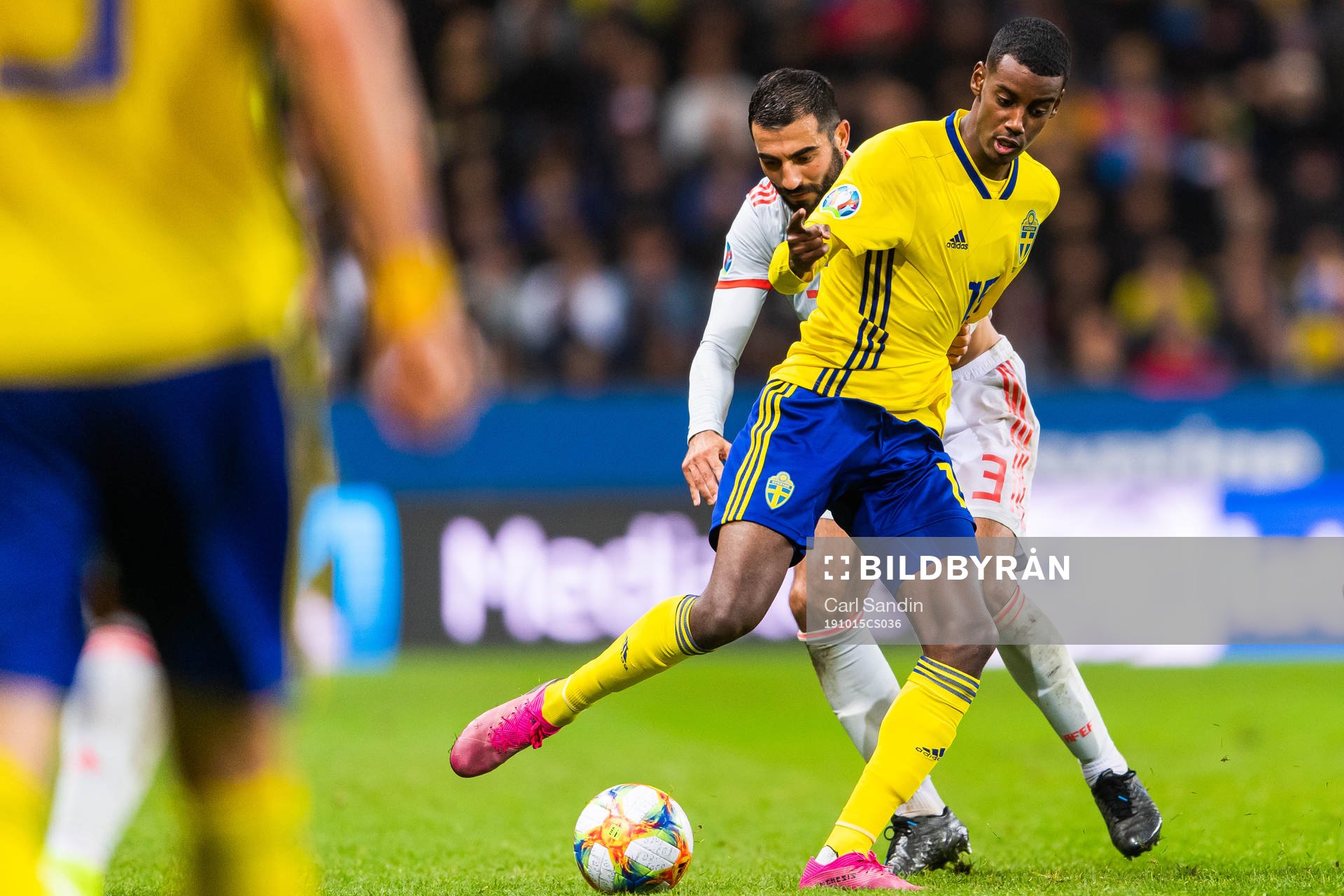 Raul Albiol of Spain and Alexander Isak of Sweden