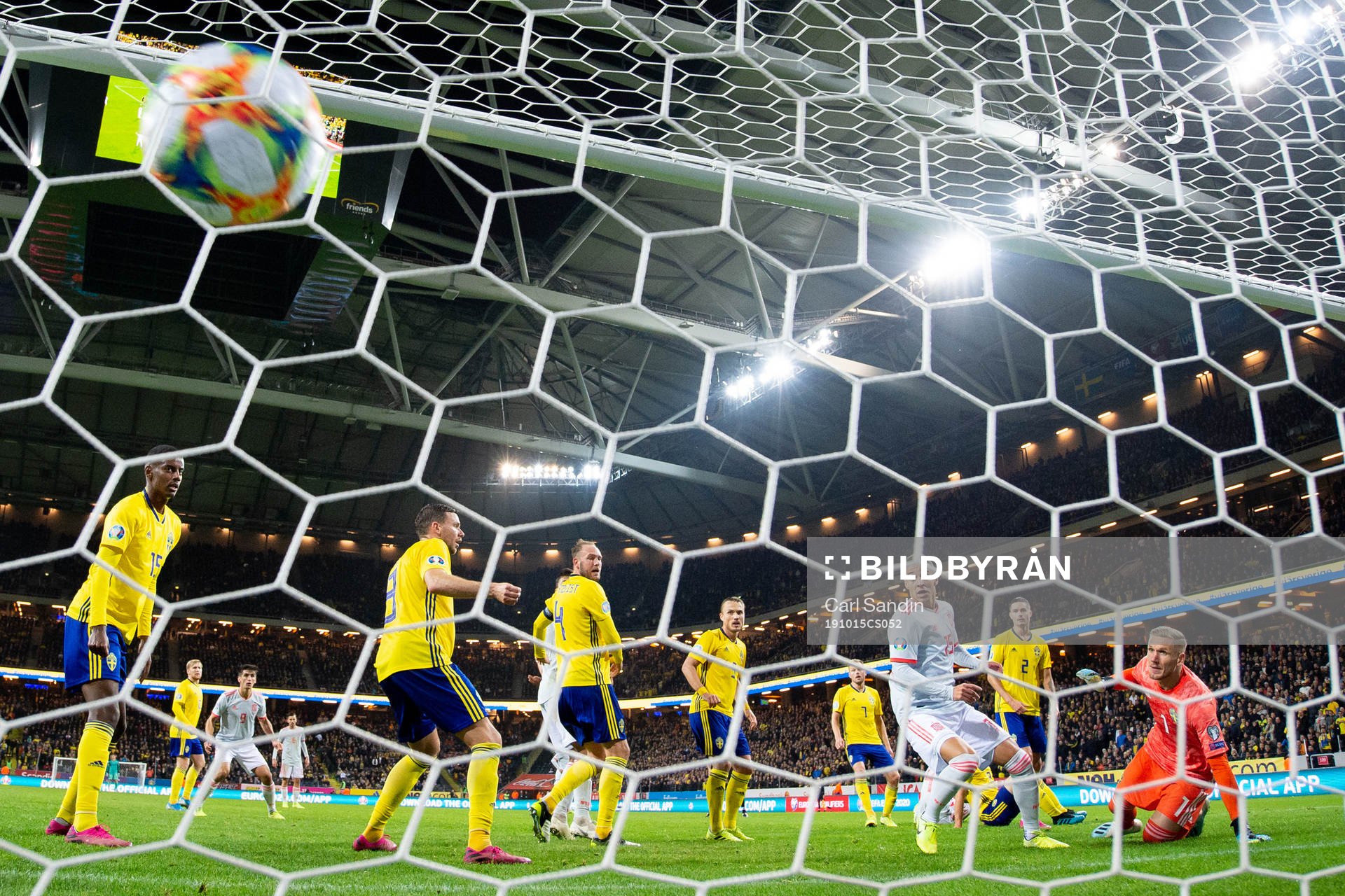 Rodrigo of Spain scores 1-1 behind goalkeeper Robin Olsen