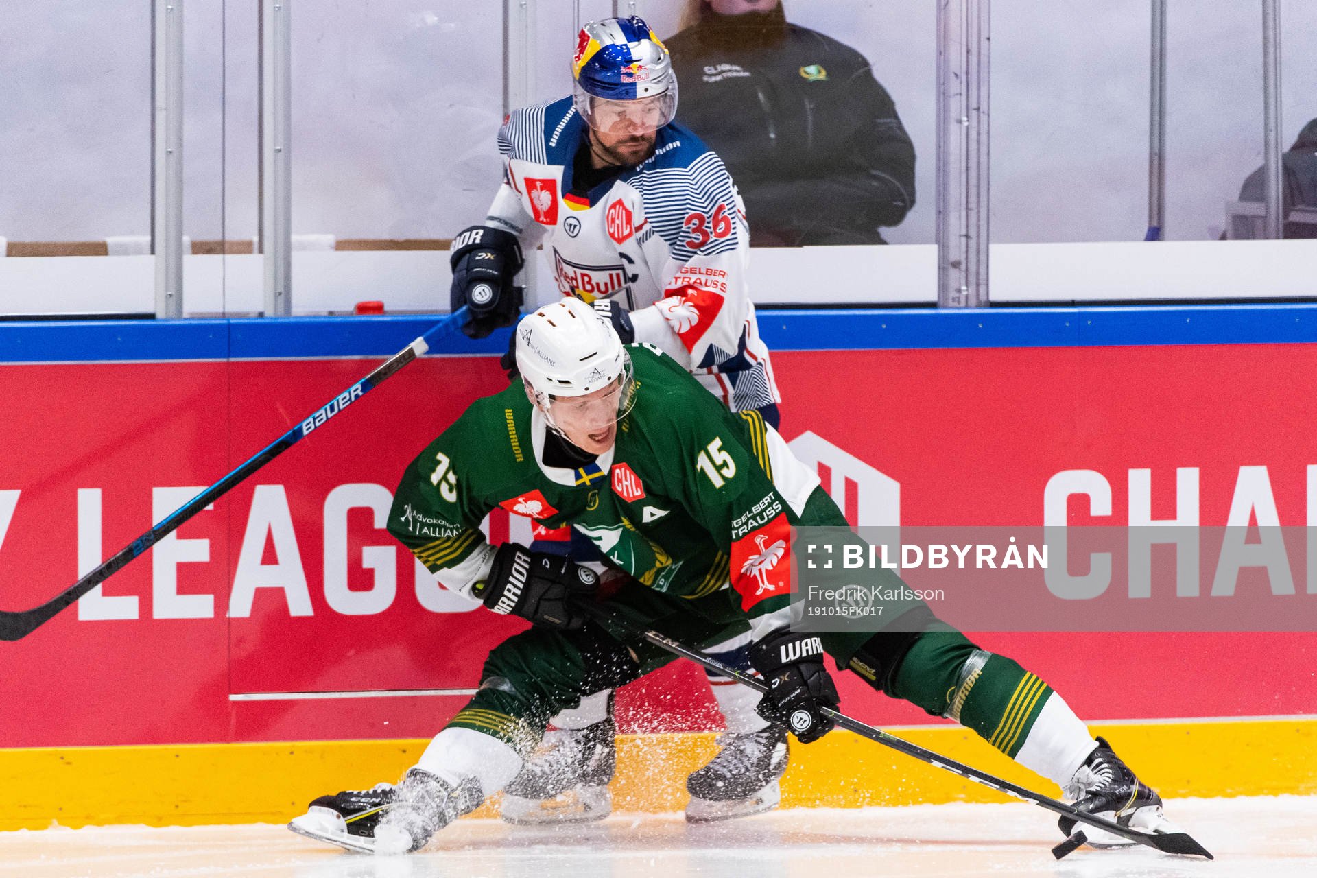 Gustav Rydahl of Färjestad and Yannic Seidenberg  of Red