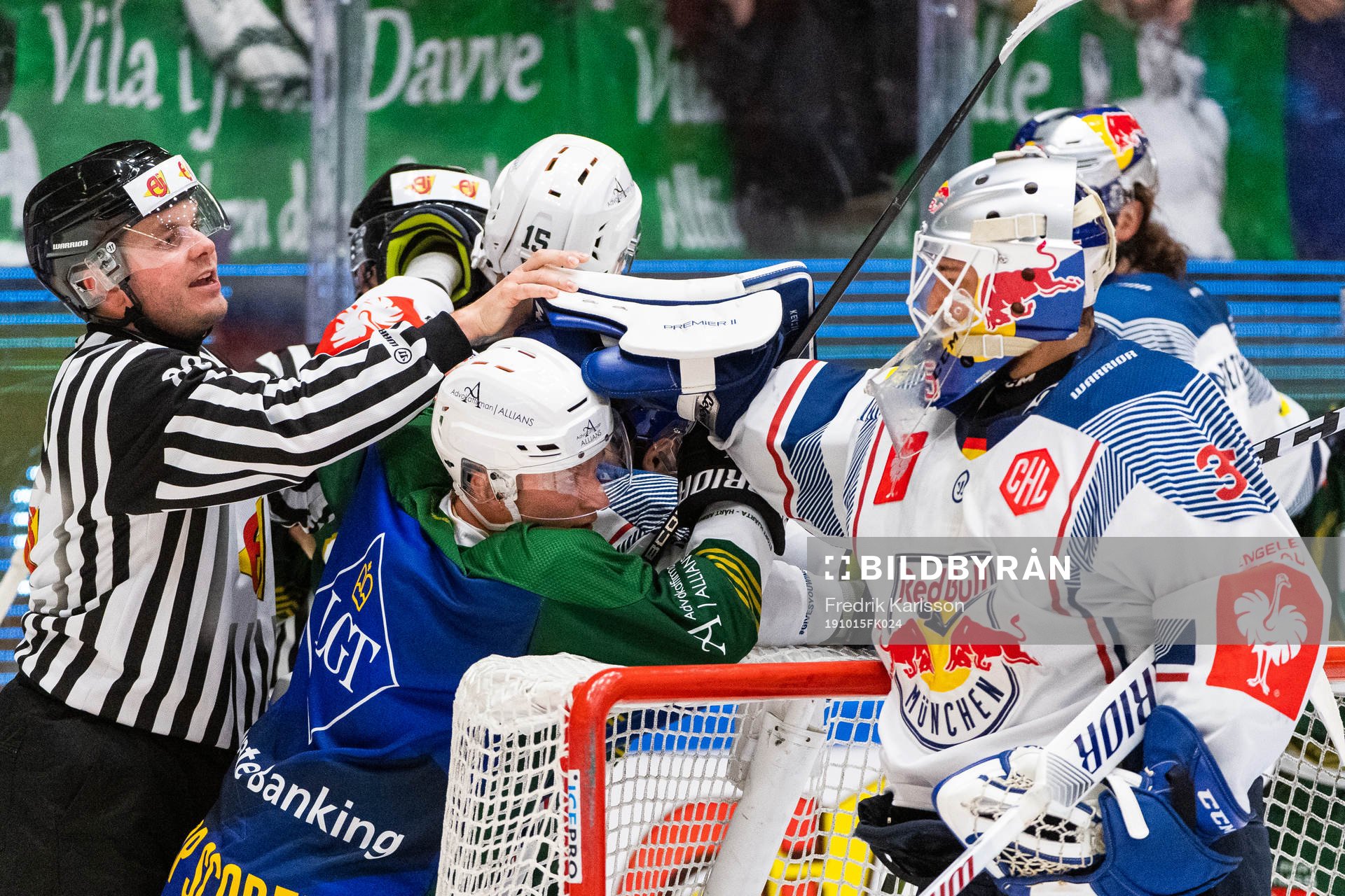 Marcus Nilsson of Färjestad and goalkeeper Kevin Reich of