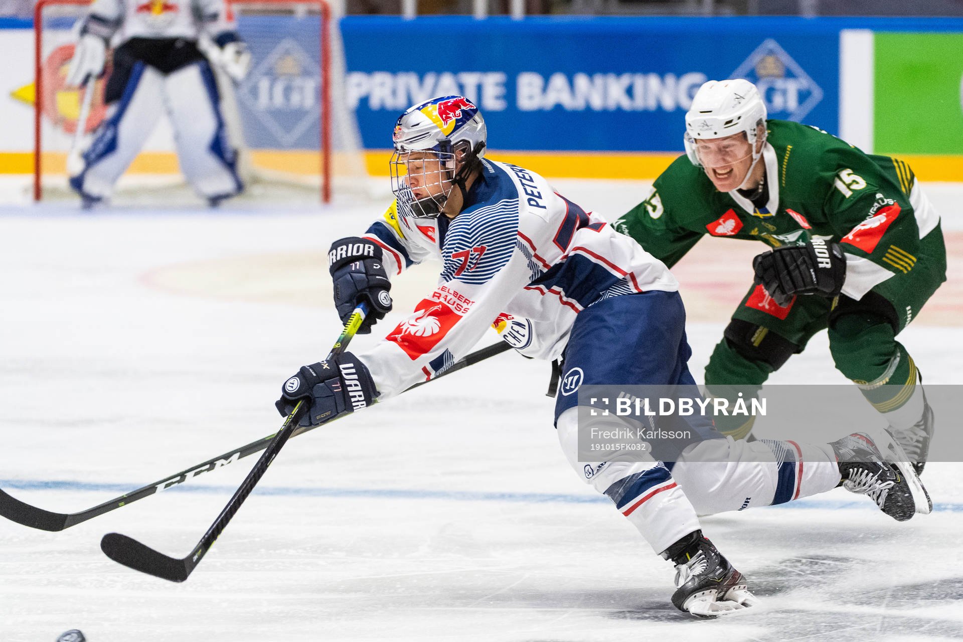 John Jason Peterka of Red Bull Munich and Gustav Rydahl of