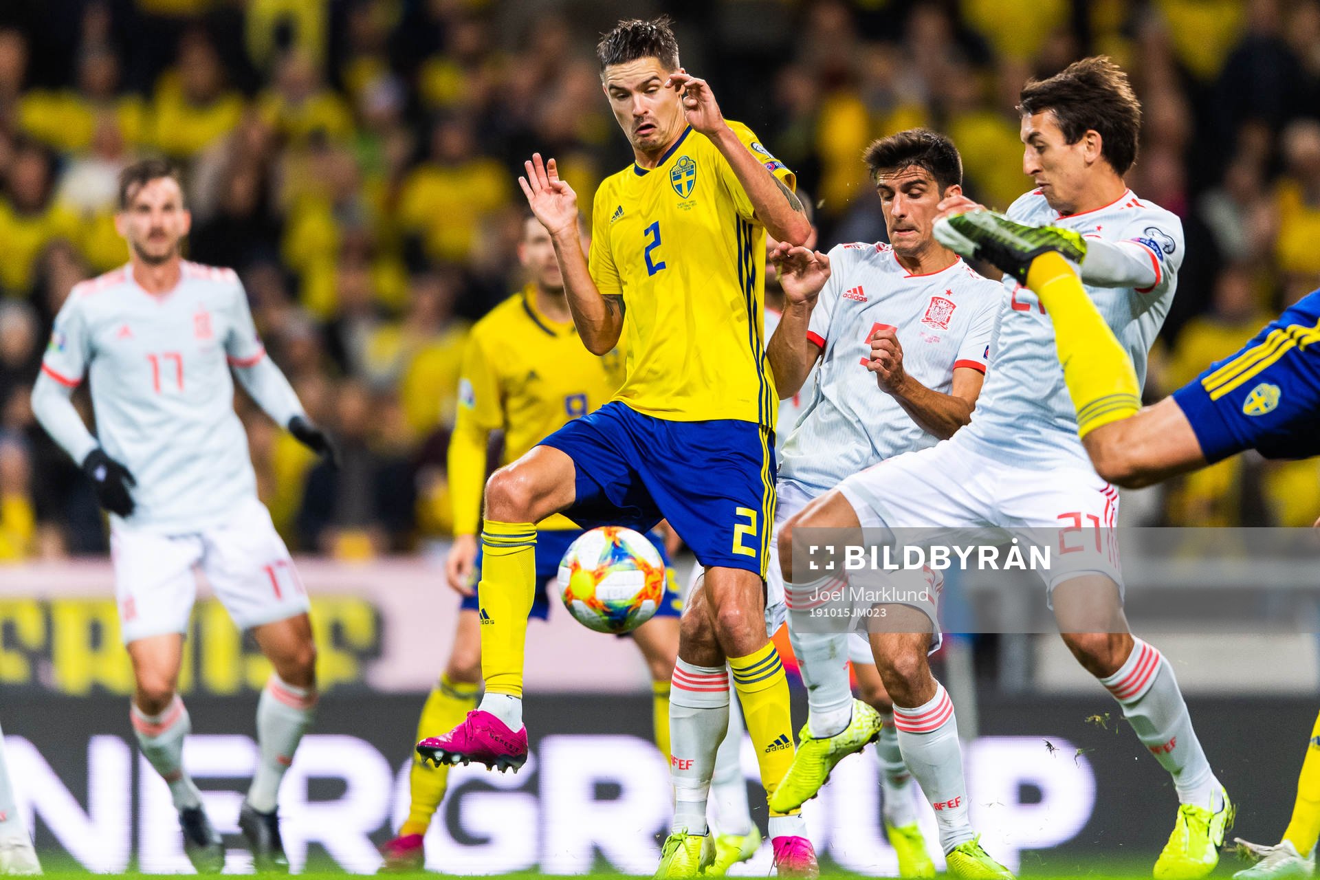 Mikael Lustig of Sweden competes for the ball with Sergio Busquets and Mikel Oyarzabal of Spain during the UEFA Euro Qualifier football match between Sweden and Spain on October 15, 2019 in Stockholm.