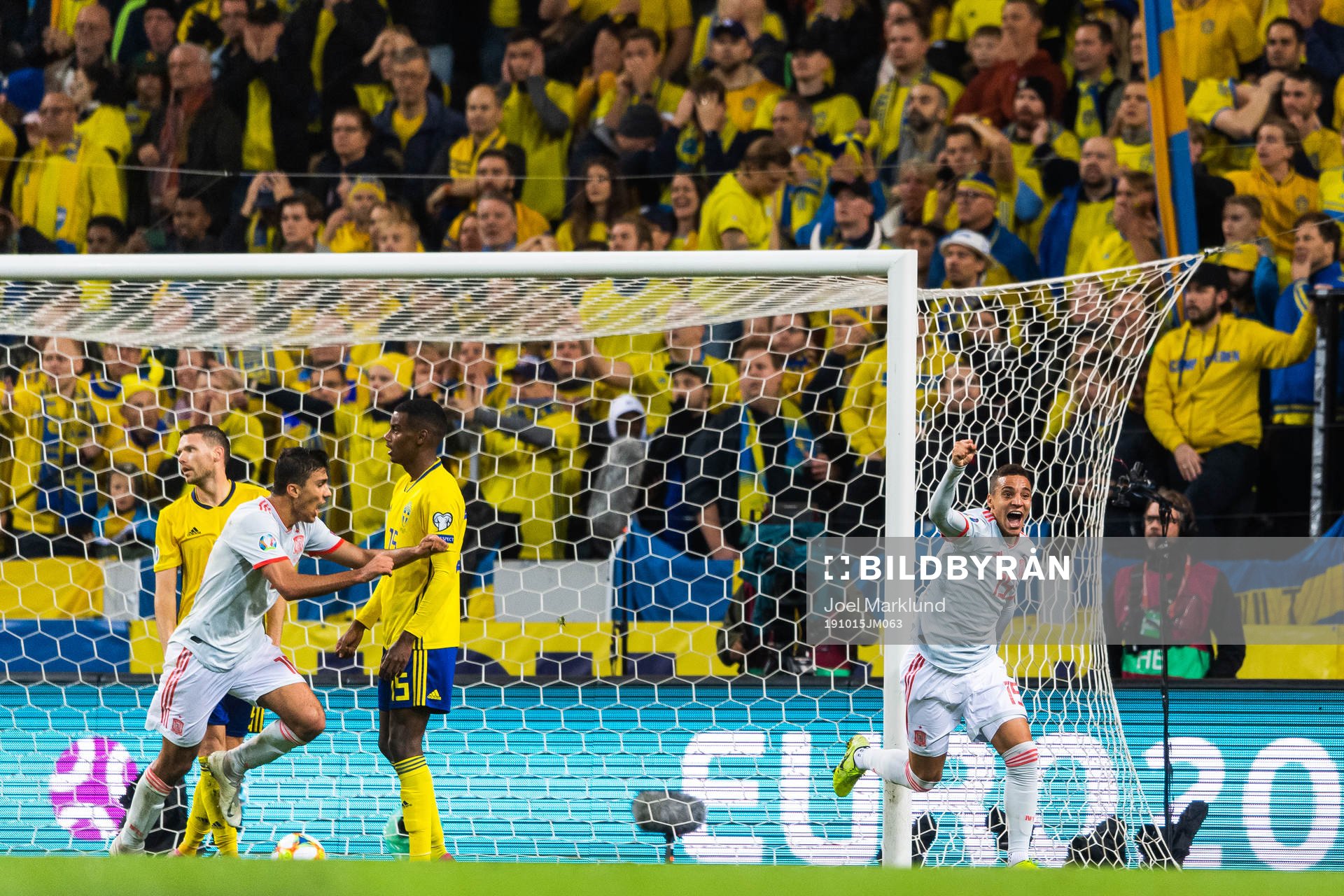 Marcus Berg and Alexander Isak look dejected as Rodrigo of