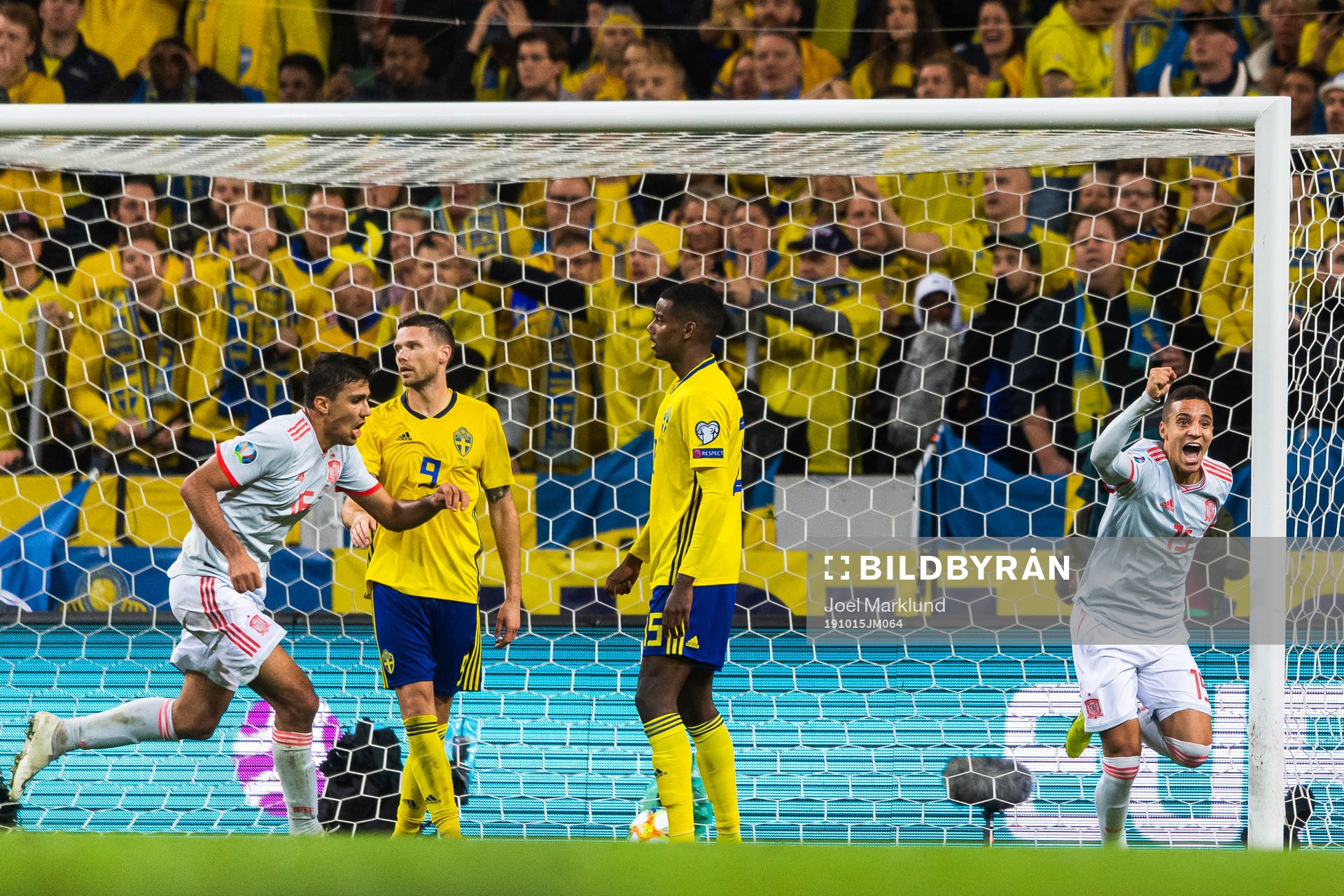 Marcus Berg and Alexander Isak look dejected as Rodrigo of