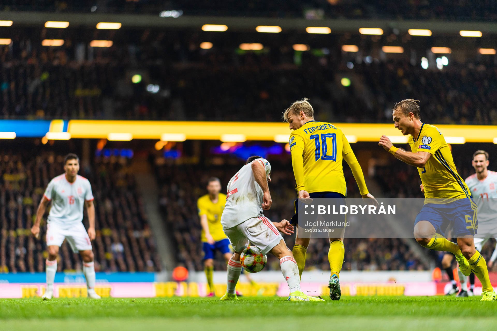 Emil Forsberg and Pierre Bengtsson of Sweden against Dani Carvajal of Spain during the UEFA Euro Qualifier football match between Sweden and Spain on October 15, 2019 in Stockholm.