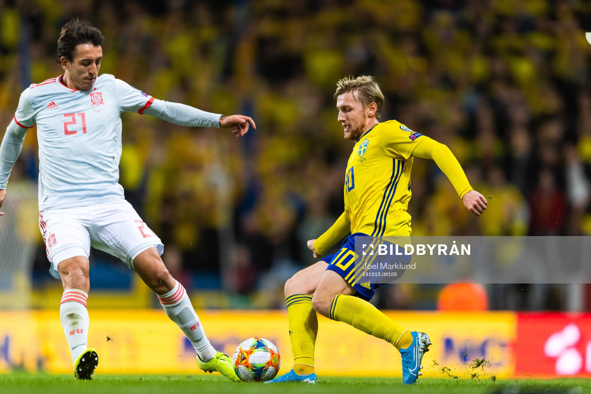 Mikel Oyarzabal of Spain and Emil Forsberg of Sweden