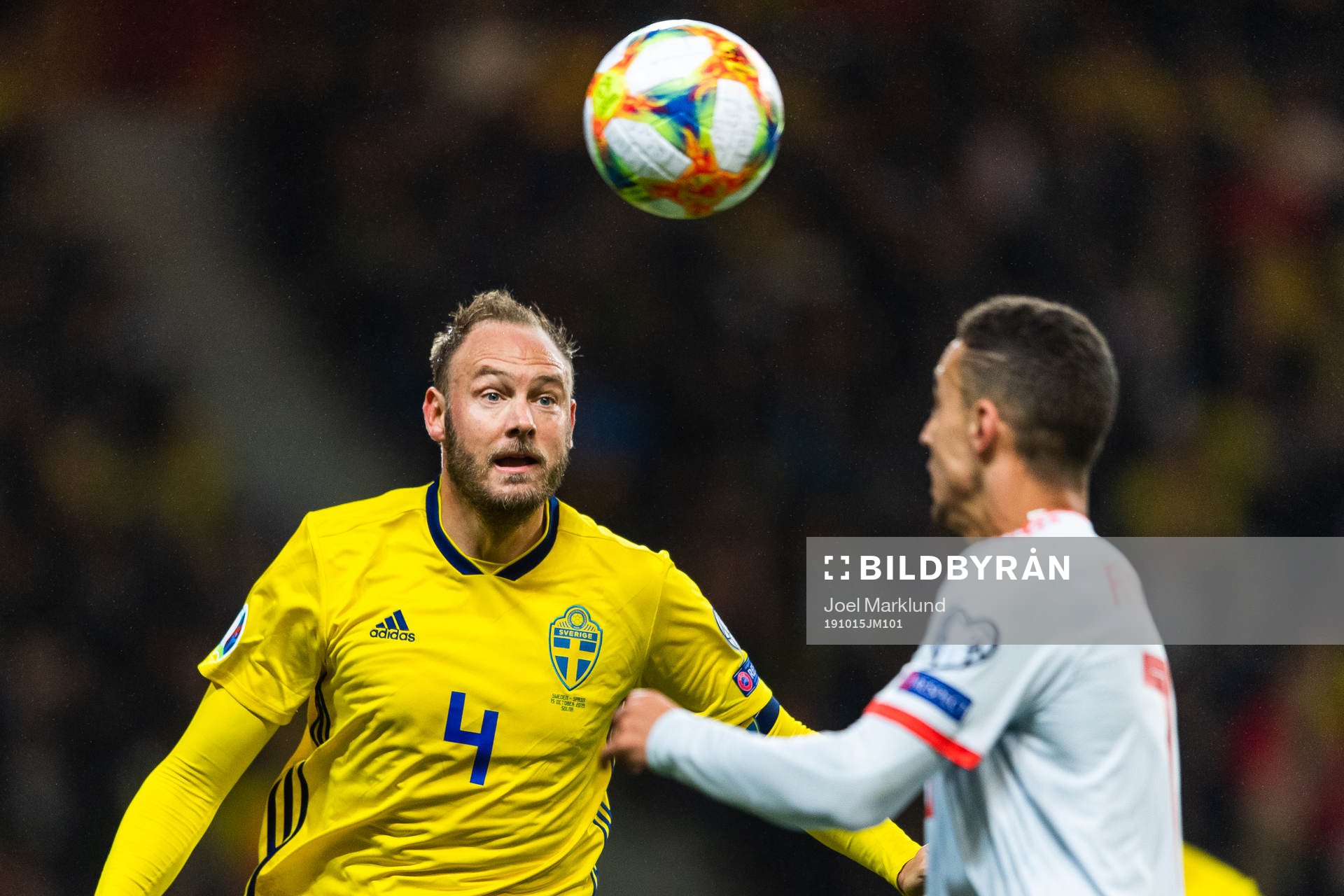 Andreas Granqvist of Sweden and Rodrigo of Spain