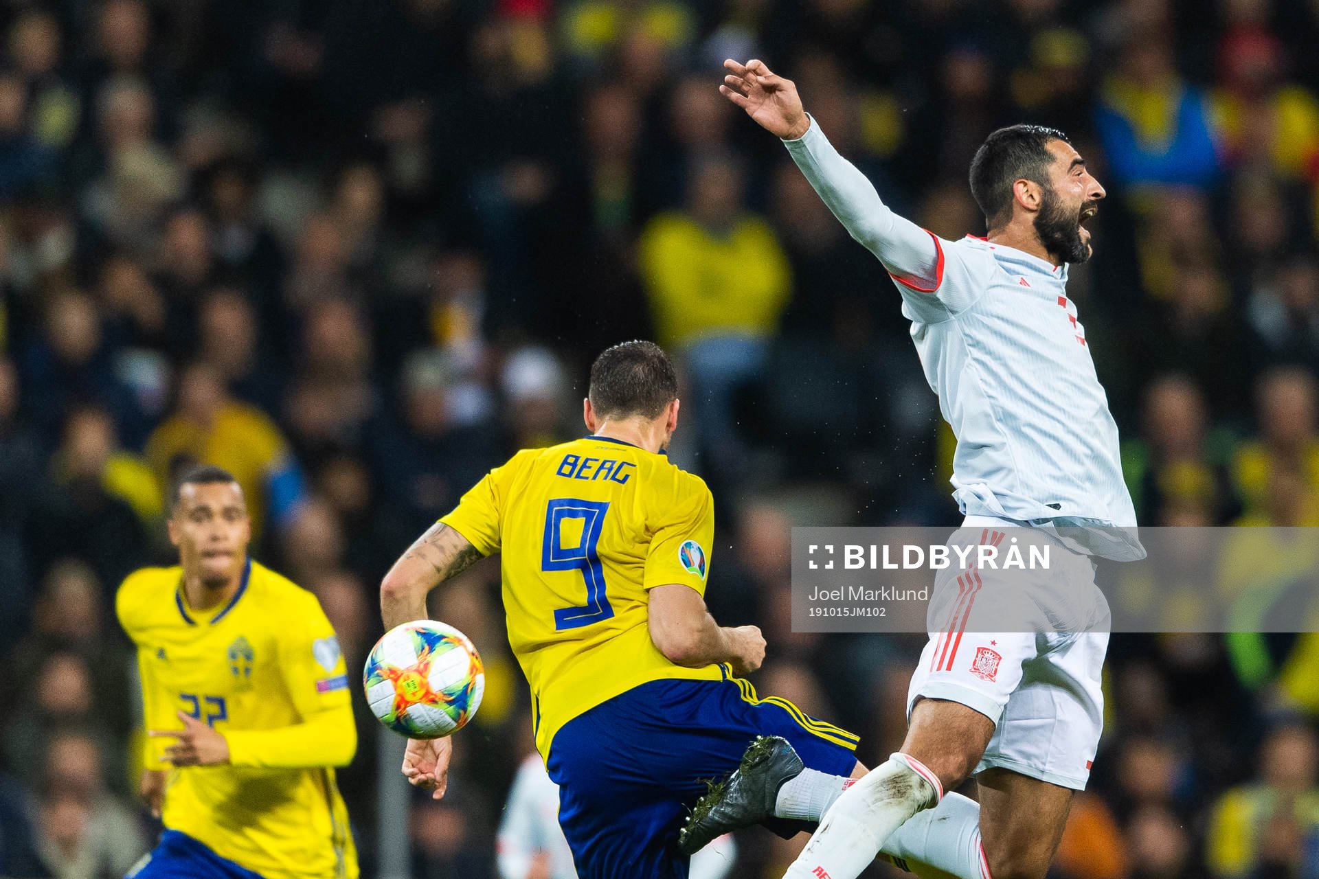 Marcus Berg of Sweden and Raul Albiol of Spain