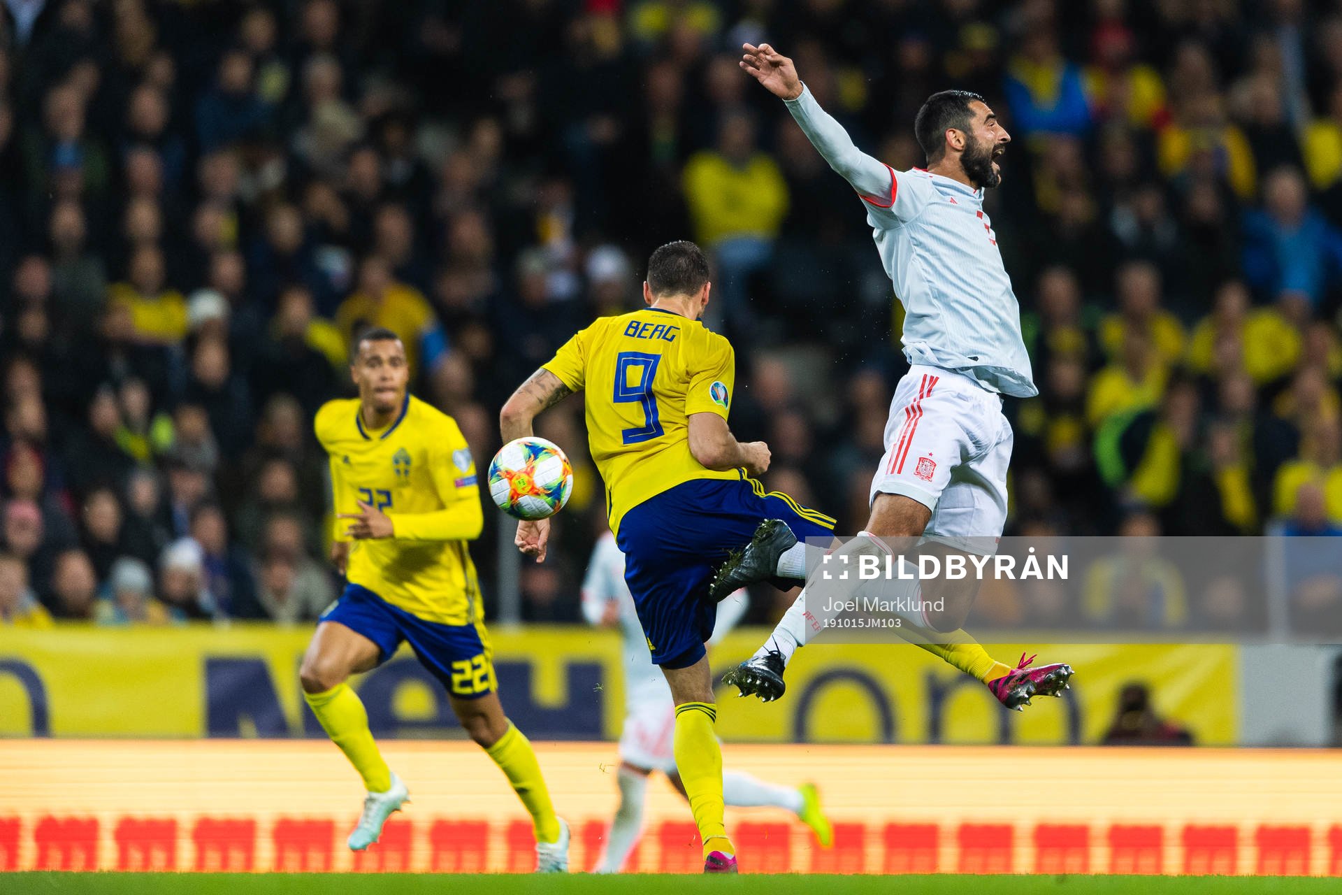 Marcus Berg of Sweden and Raul Albiol of Spain