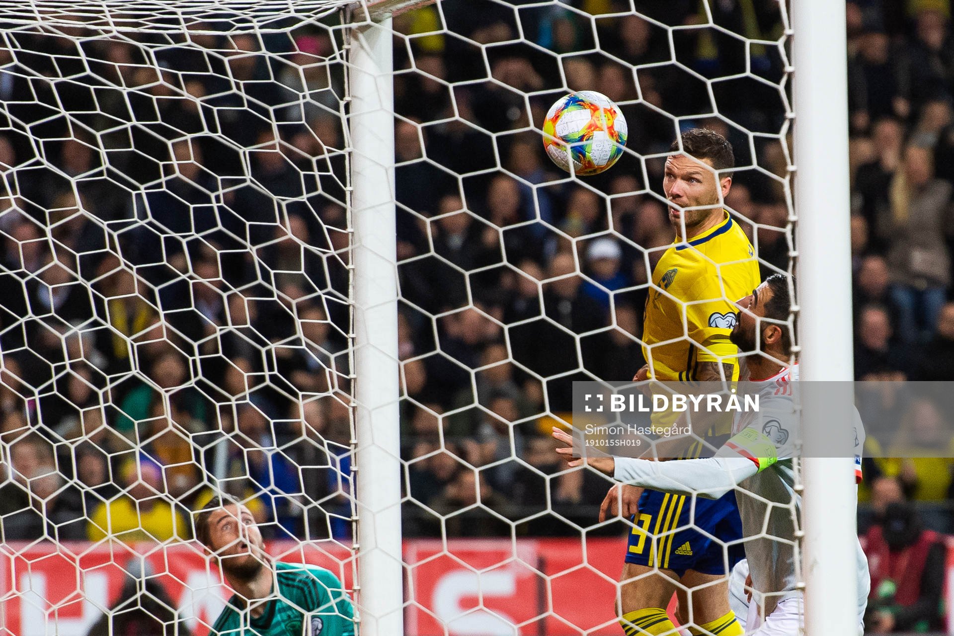 Goalkeeper David de Gea and Raul Albiol of Spain see Marcus