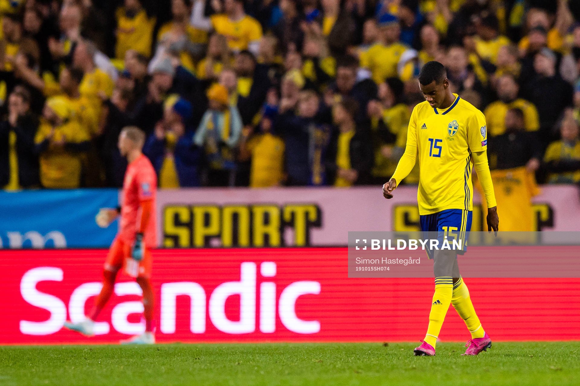 Goalkeeper Robin Olsen and Alexander Isak of Sweden look