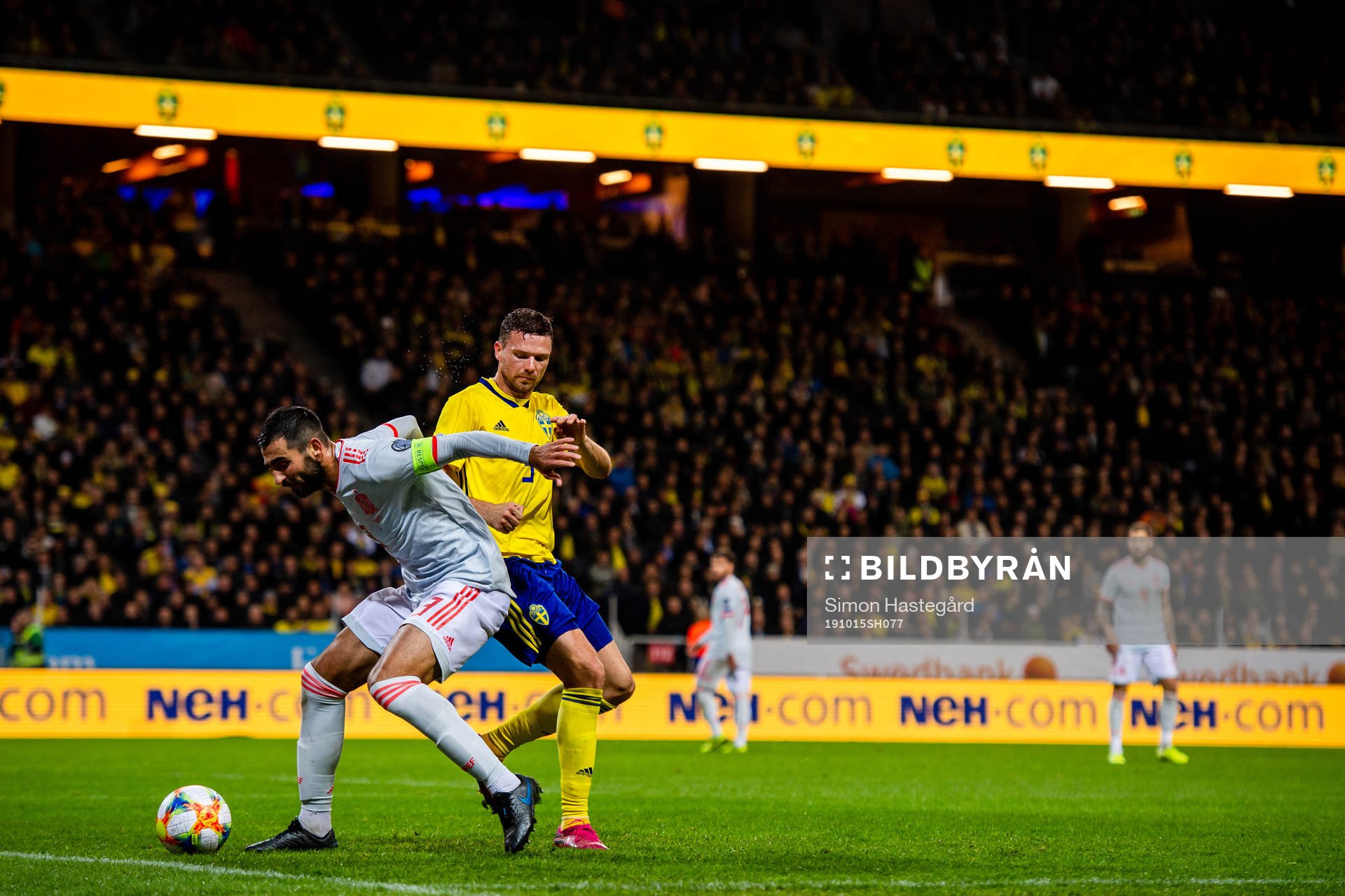 Raul Albiol of Spain against Marcus Berg of Sweden