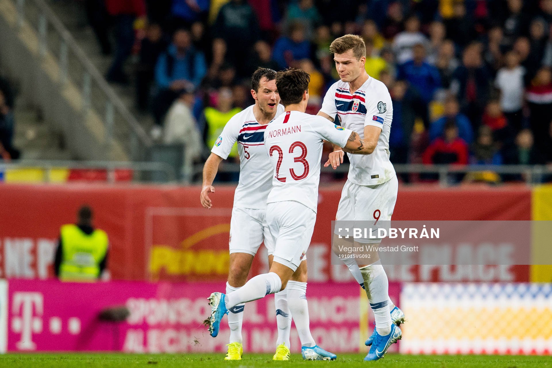 Alexander Sørloth of Norway celebrates with Even Hovland and Mathias Normann after scoring 1-1 during the UEFA Euro Qualifier football match between Romania and Norway on October 15, 2019 in Bucharest.