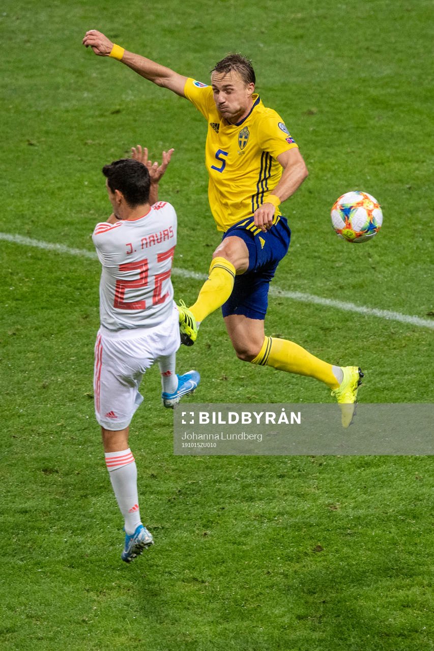 Pierre Bengtsson  of Sweden and Jesus Navas of Spain
