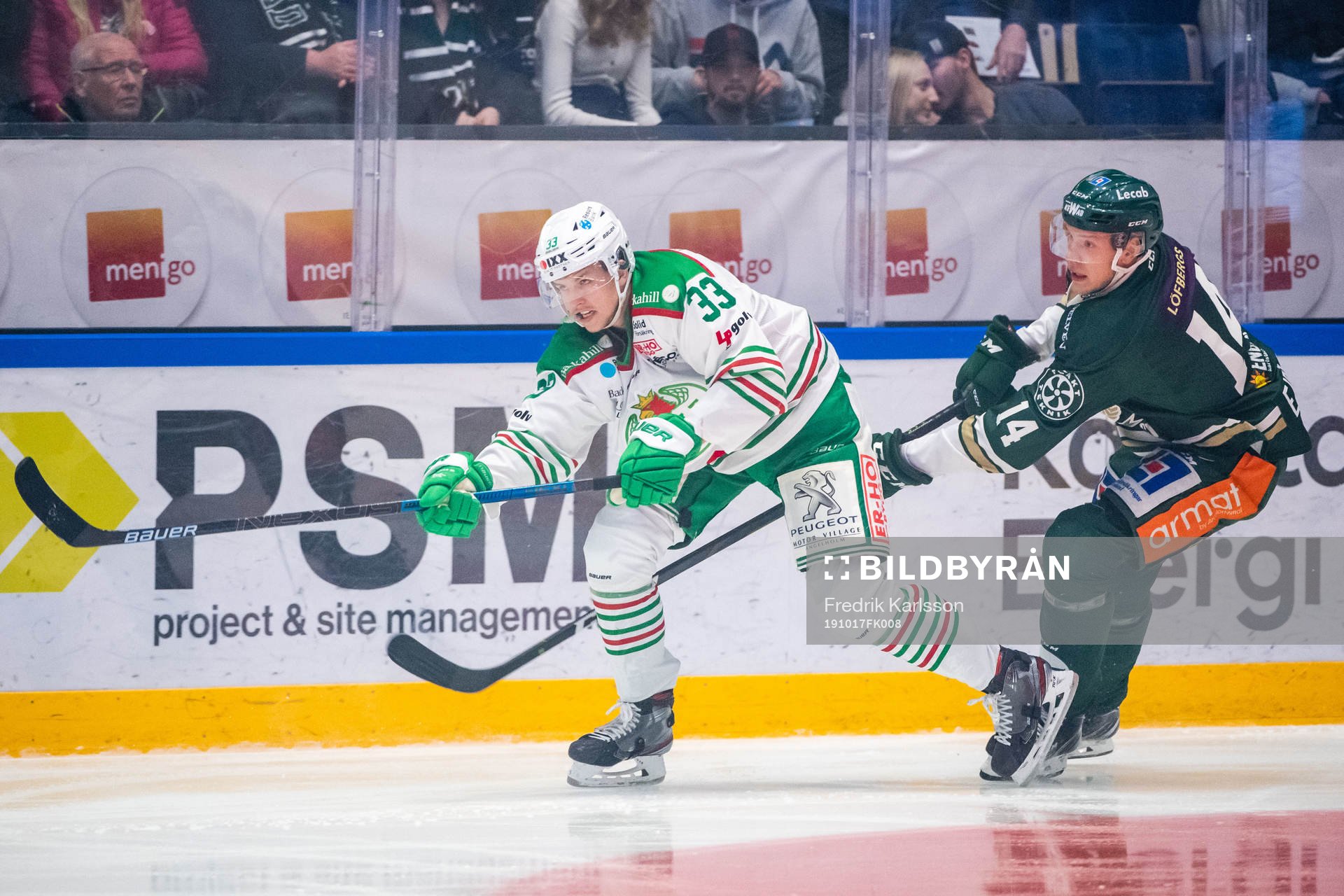 Rögles Niklas Hansson och Färjestads Victor Ejdsell