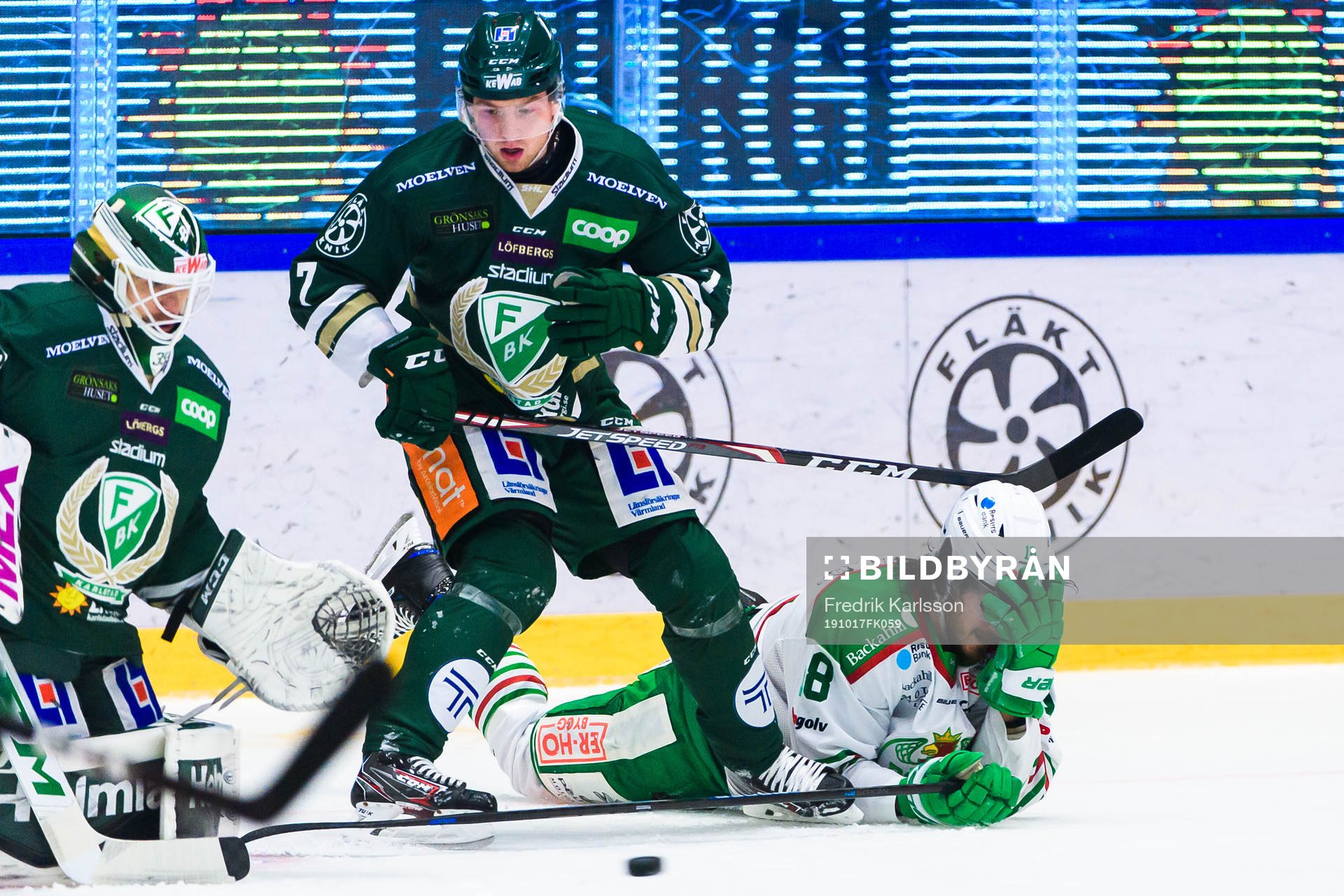 Färjestads målvakt Markus Svensson, Johan Ivarsson och