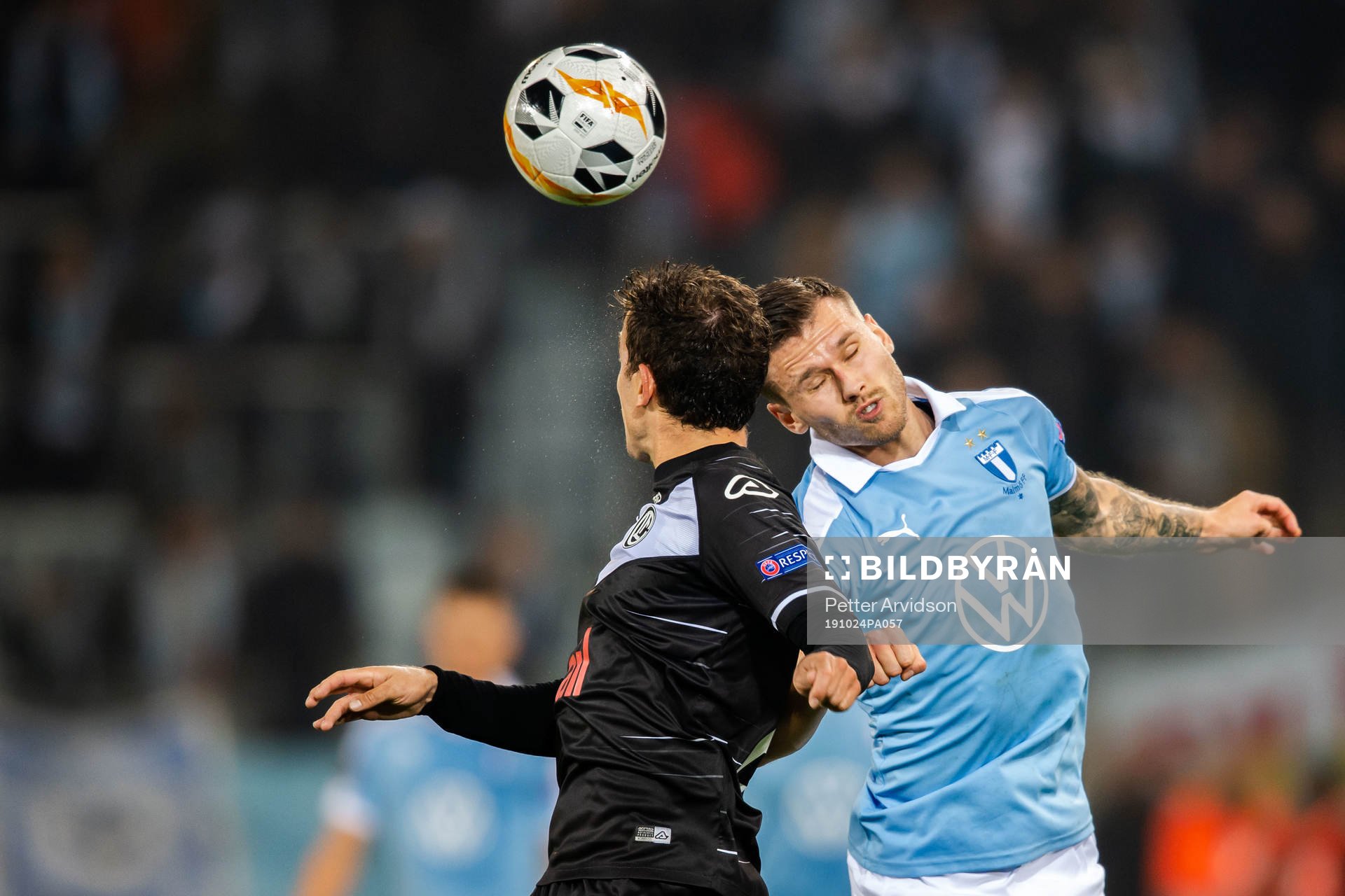 Arnor Traustason of Malmö FF and Olivier Custodio of Lugano