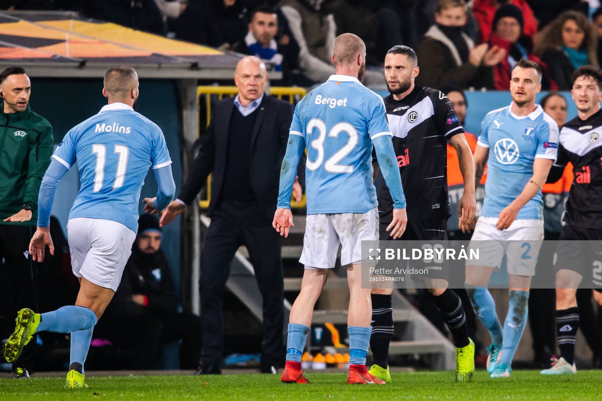 Jo Inge Berget of Malmö FF in a dispute with Fabio Daprela